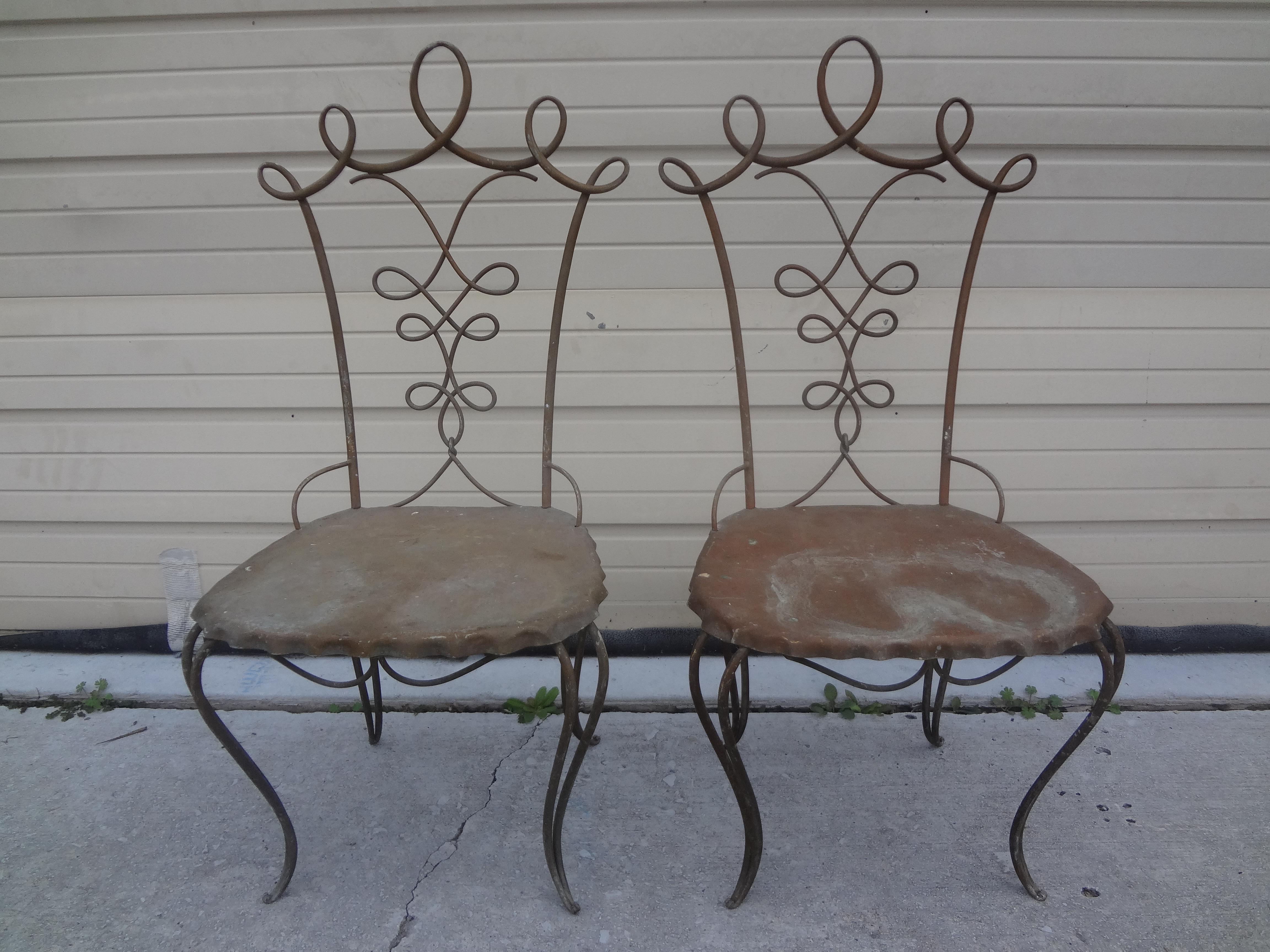 Pair of French Art Deco chairs attributed to Raymond Subes.
Stylish pair of French Art Deco hand forged wrought iron chairs attributed to Raymond Subes.
This chic pair of French side chairs could be polished or a cushion added if desired.
Gorgeous
