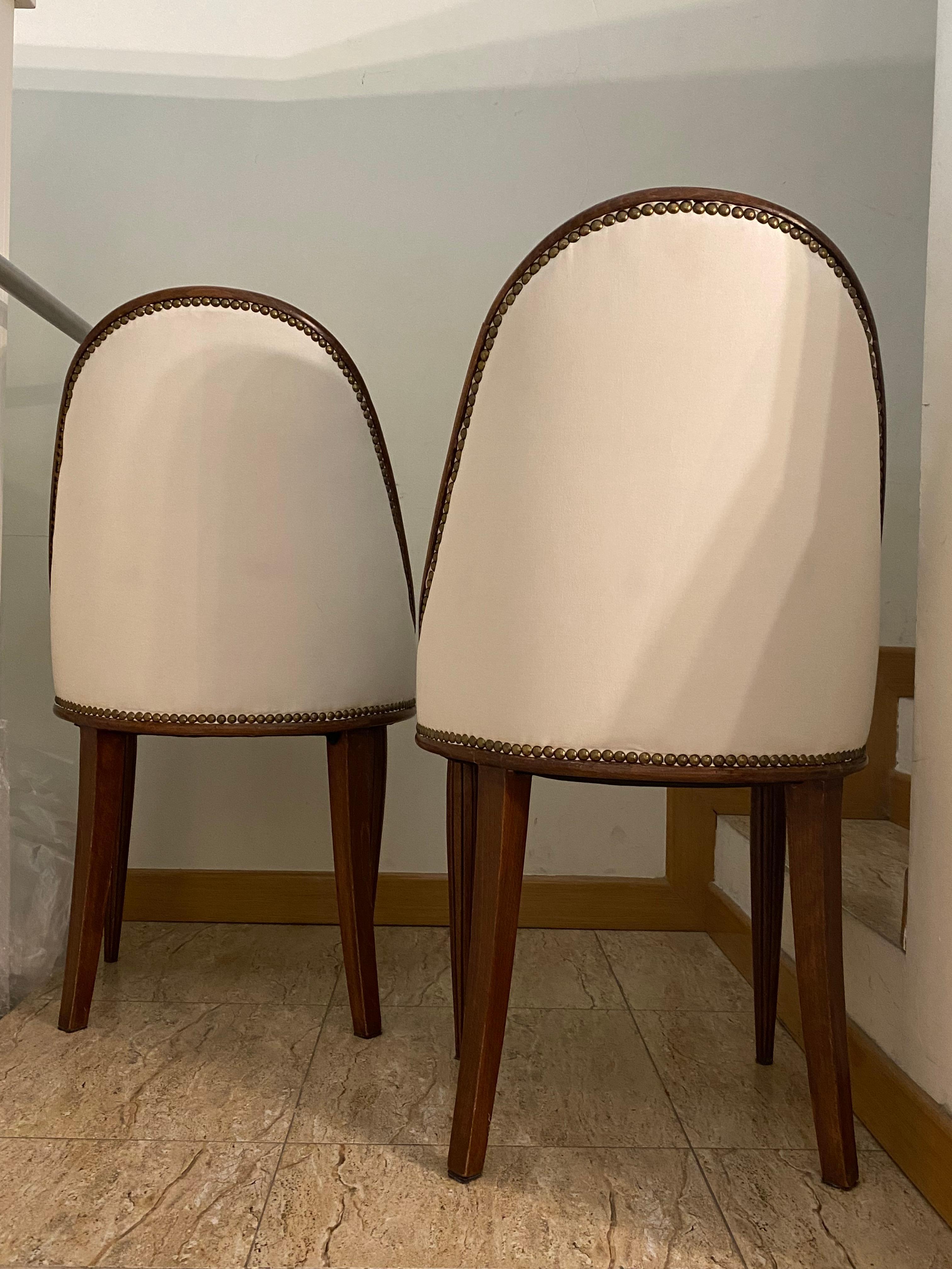 Beautiful pair of French chairs from the early years of the art deco style, made in Paris around 1915. They represent the best French design of the early 20th century. Reupholstered and restored the varnish, following the original techniques. They
