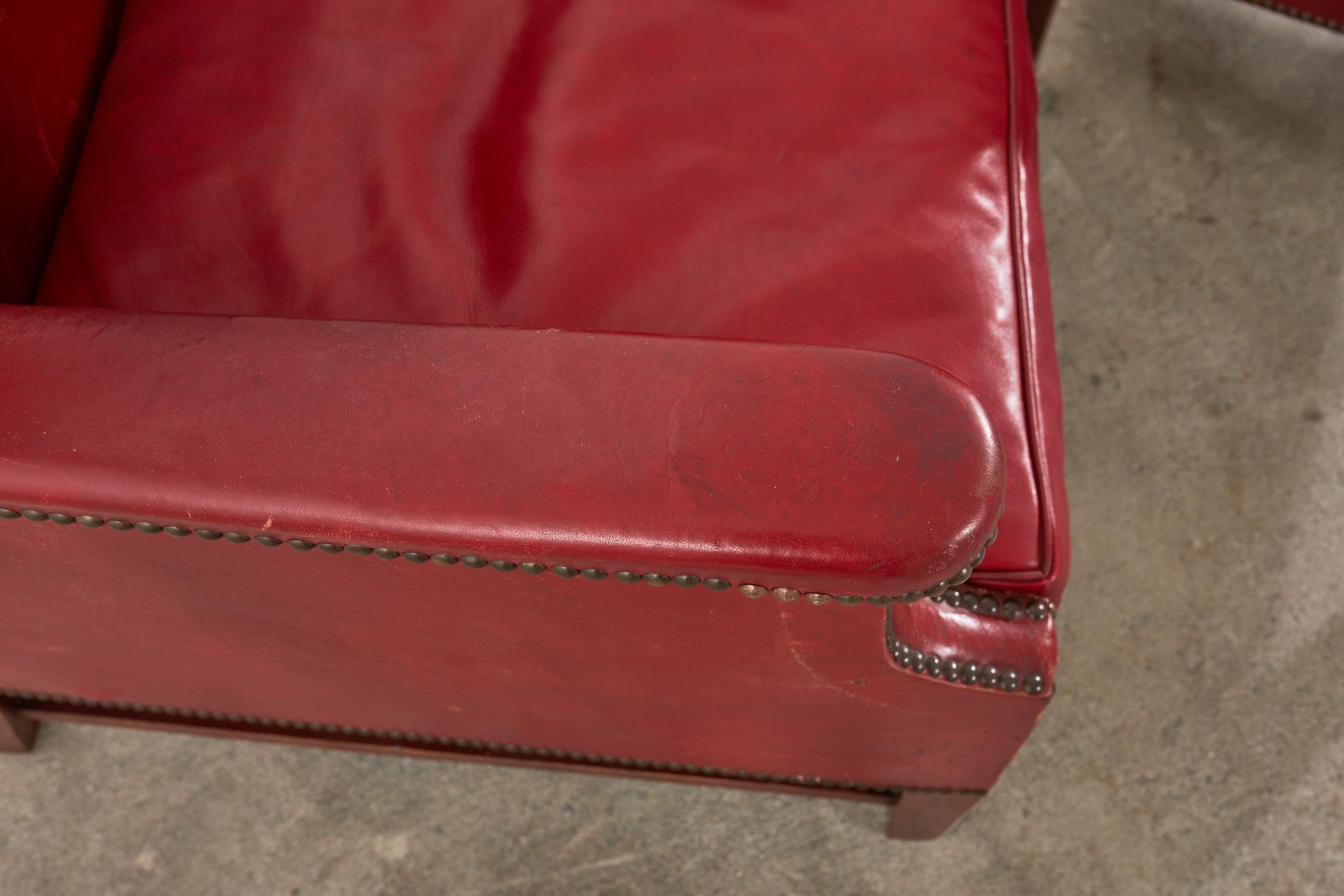 Pair of French Art Deco Cherry Red Leather Wingback Chairs In Distressed Condition For Sale In Rio Vista, CA