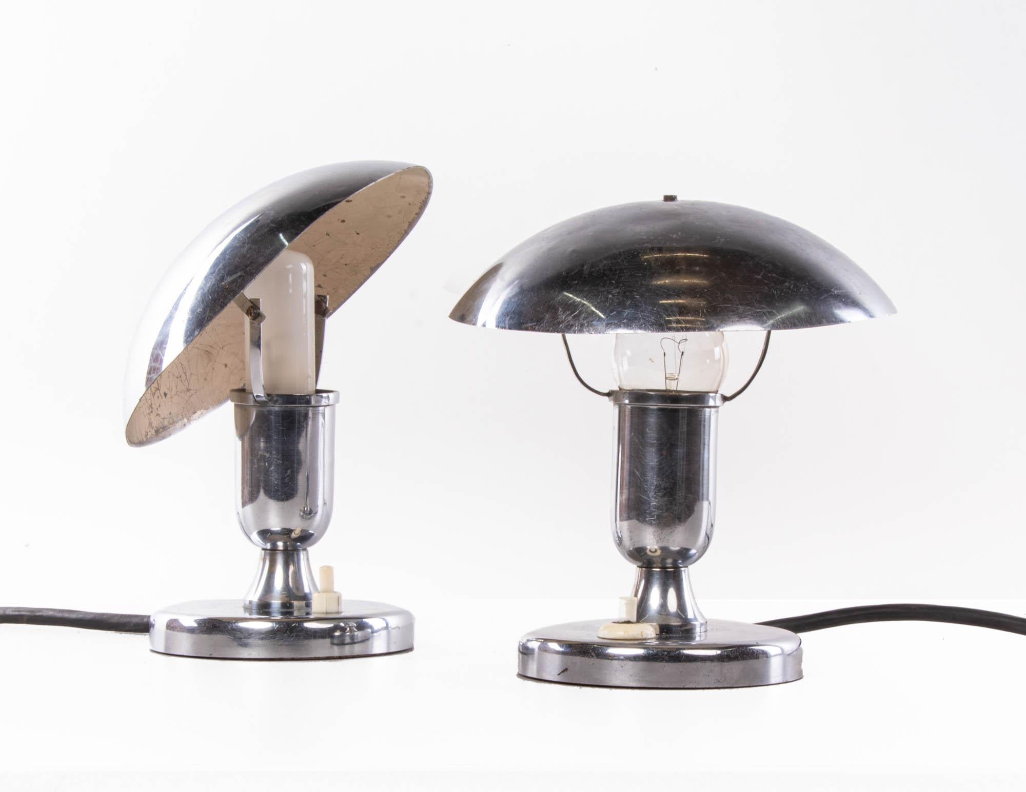 These elegant adjustable chromed table lamps are a great example of French lighting from the Art Deco / Bauhaus era. Quality, craftsmanship and functionalism in its finest form. 

Measures: diameter 6.7