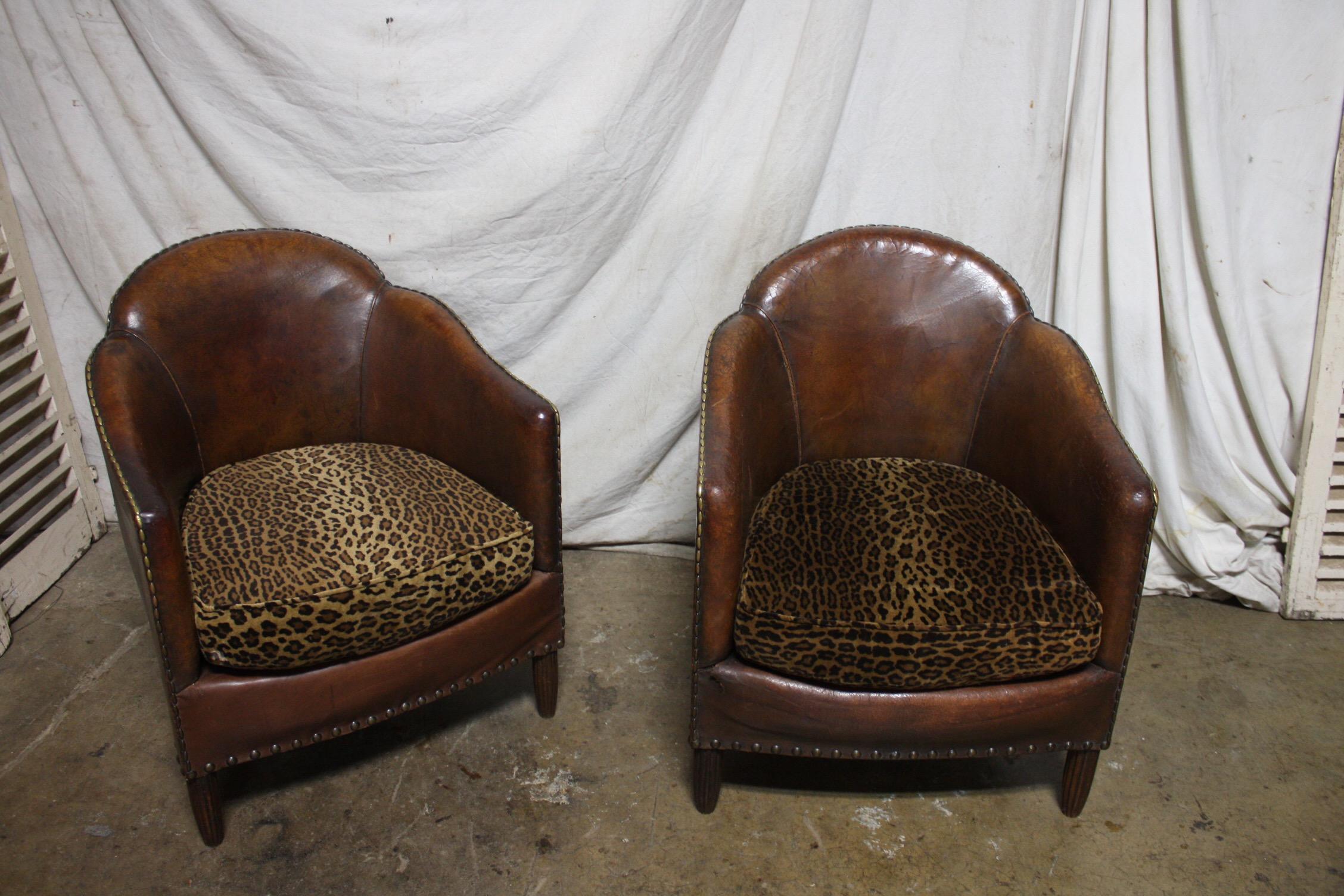 Beautiful pair of Art Deco club chairs, the leather has a wonderful patine, a lot of character.