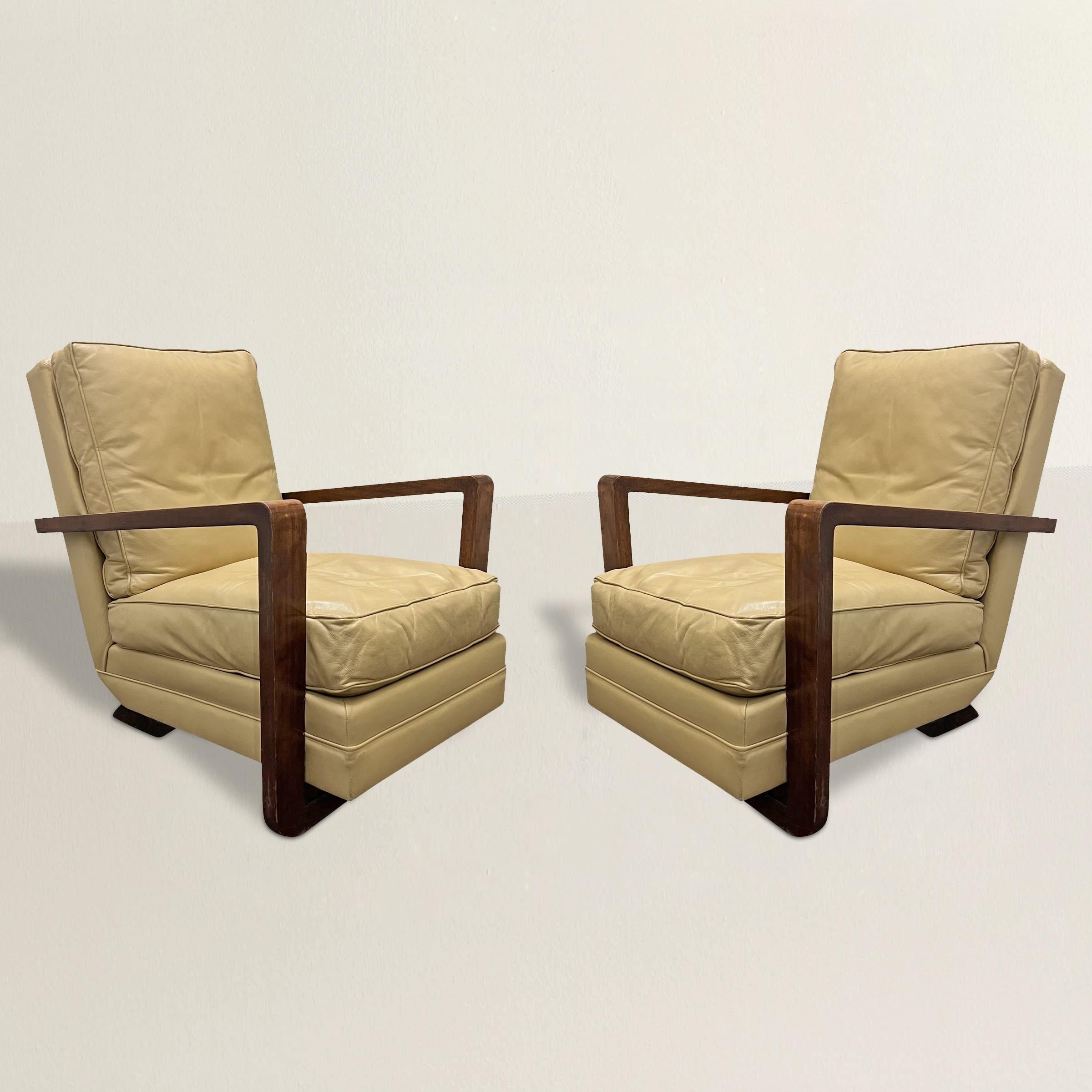Step into the glamorous world of French Art Deco with this exquisite pair of club chairs. Crafted with simple continuous wood frames, these chairs epitomize the essence of the Art Deco movement, characterized by a harmonious blend of simple