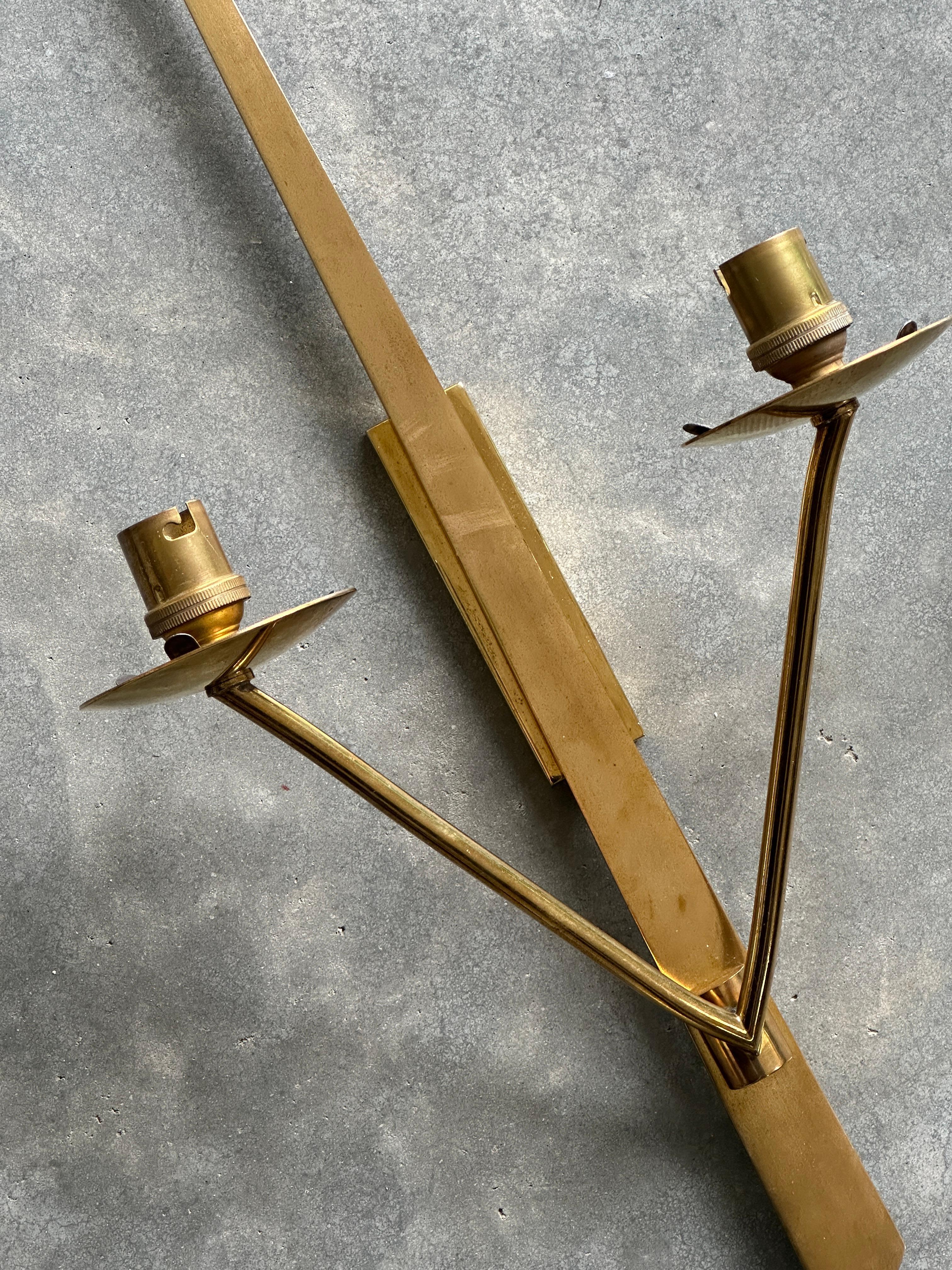 20th Century Pair of French Art Deco double bronze sconces by Lunel For Sale