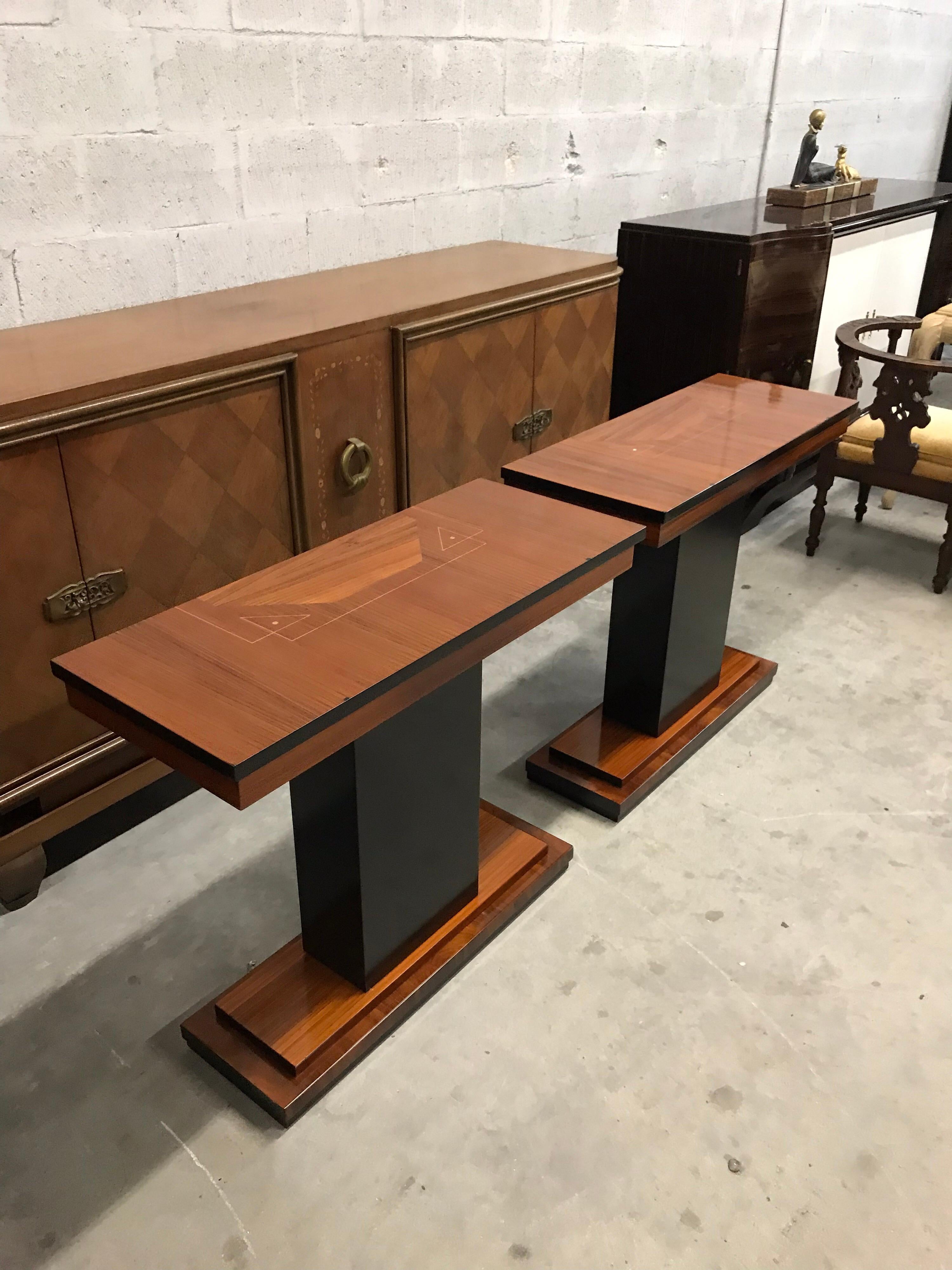 Pair of French Art Deco exotic Macassar console table, circa 1940s. Beautiful Macassar ebony with sycamore inlay, finish in both side that rest on makes it ideal for use as a bedside table or for the foyer room or entry, A fine example of Classic,