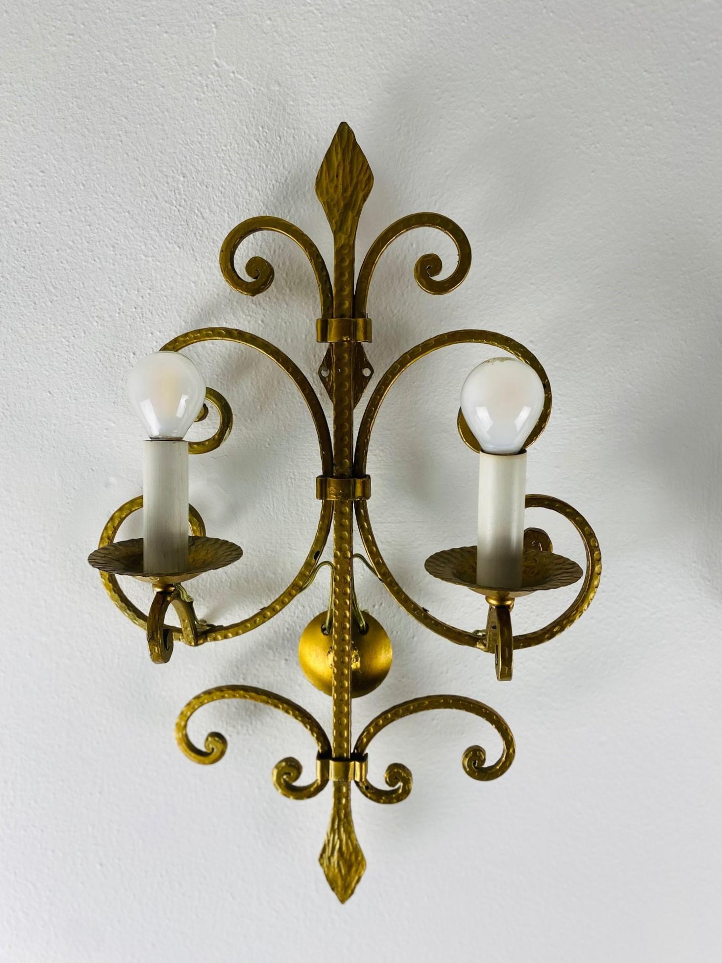 Art Deco Pair of French Wrought Iron Two-light Wall Sconces, 1930s For Sale