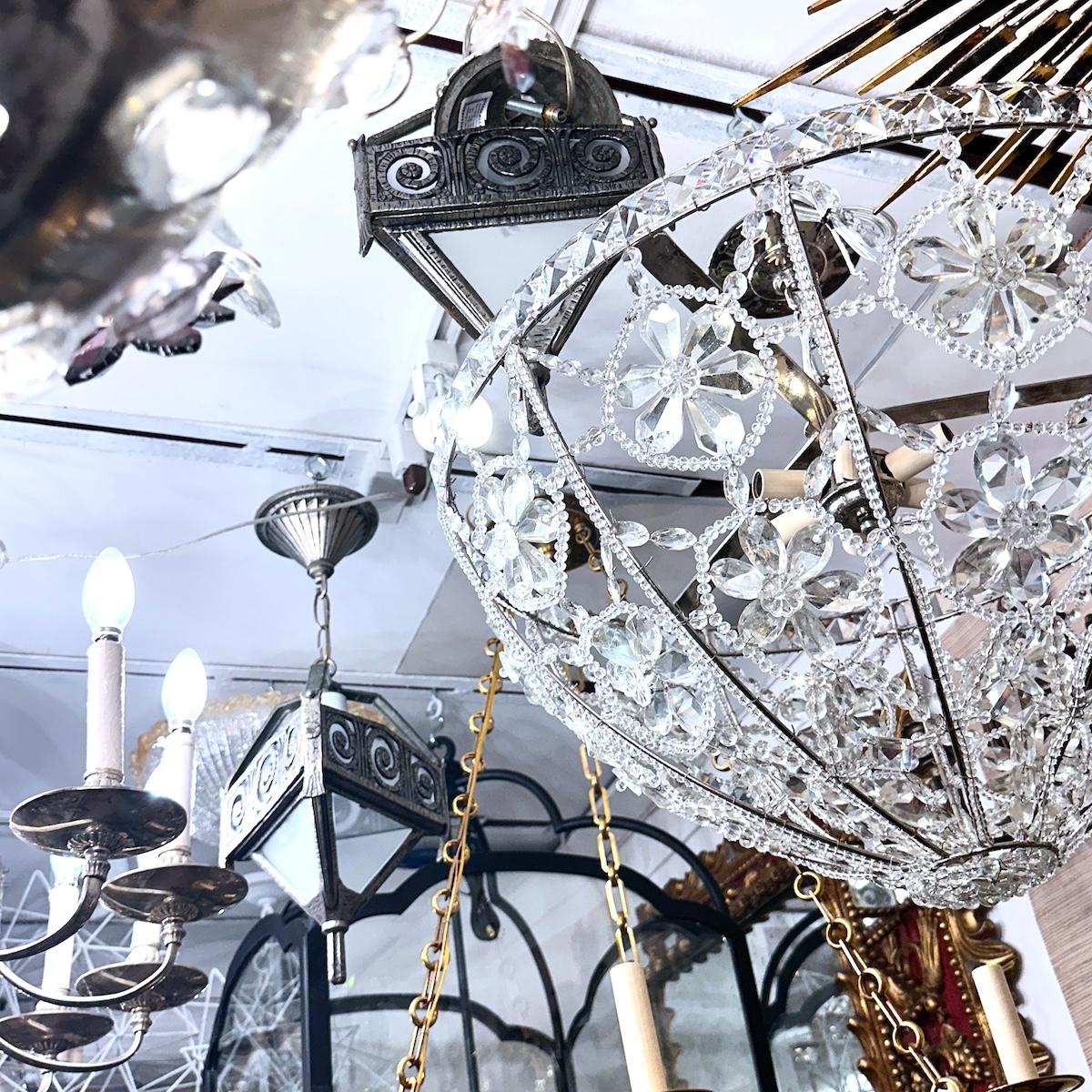 Pair of circa 1930's French hammered iron lanterns. Sold individually.

Measurements:
Current drop: 21
