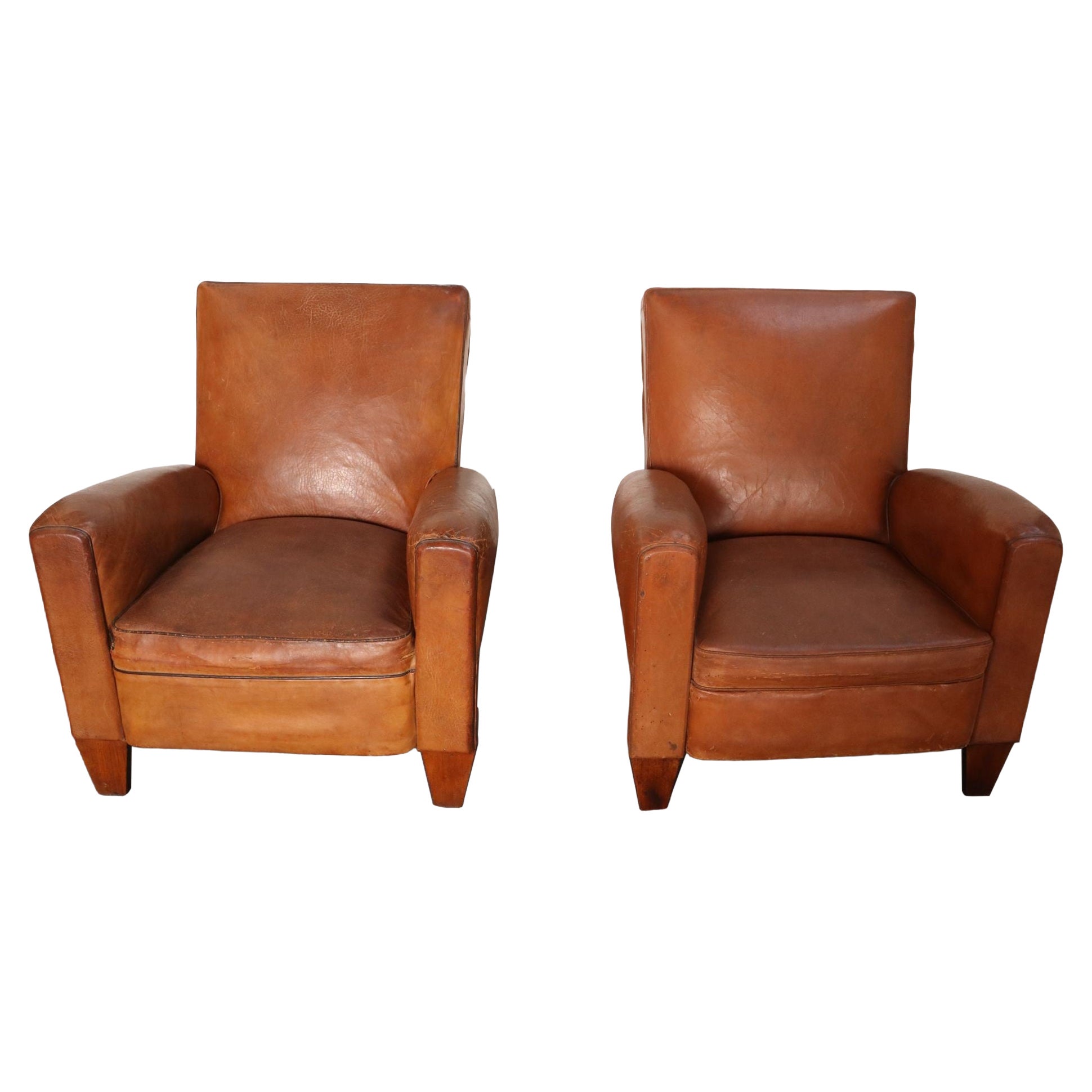 Pair of French Art Deco Leather Angled Back Club Chairs with Nailhead Decoration For Sale