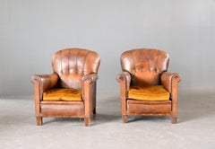 Coppia di poltrone francesi in pelle in stile Art Déco, anni ’20 CIRCA