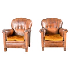 Coppia di poltrone francesi in pelle in stile Art Déco, anni ’20 CIRCA