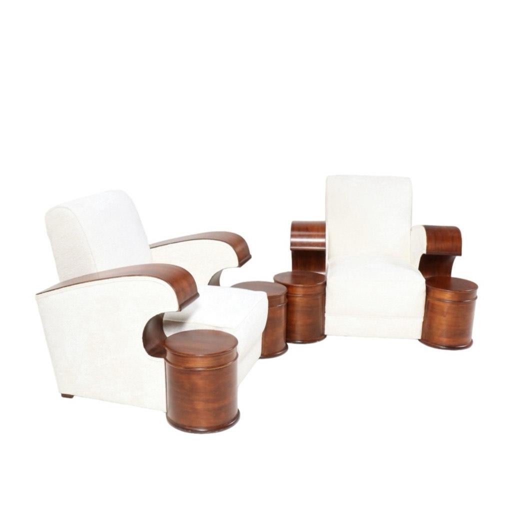 Magnificent and ultra rare pair of Art Deco club chairs.
Striking French design from the 1930s.
Original walnut frames and re-upholstered with a high quality bouclé fabric.
Ultra rare because of its design and the drums in front of the chairs!
This