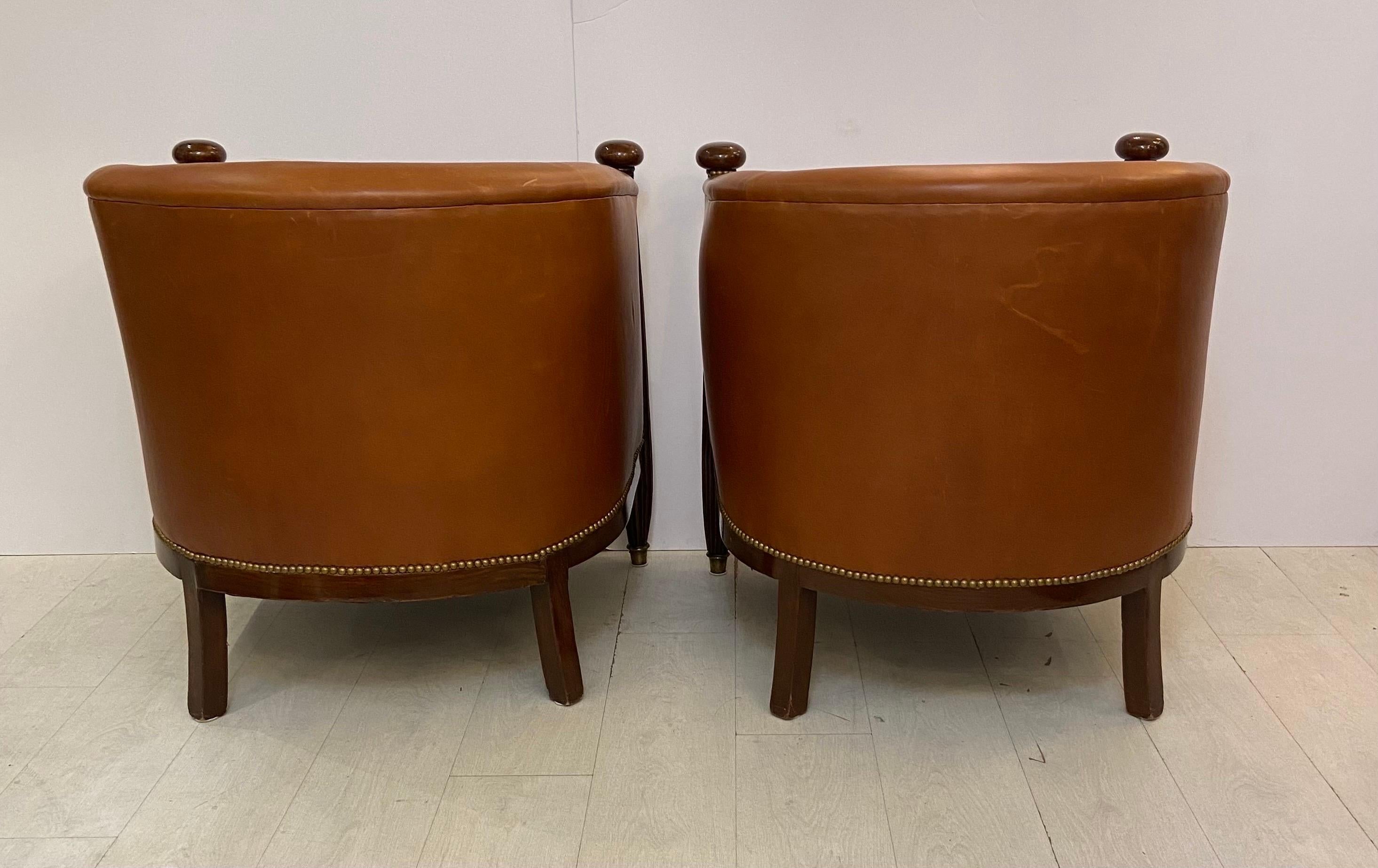 20th Century Pair of French Art Deco Mahogany Barrel Chairs Upholstered in Fine Leather 