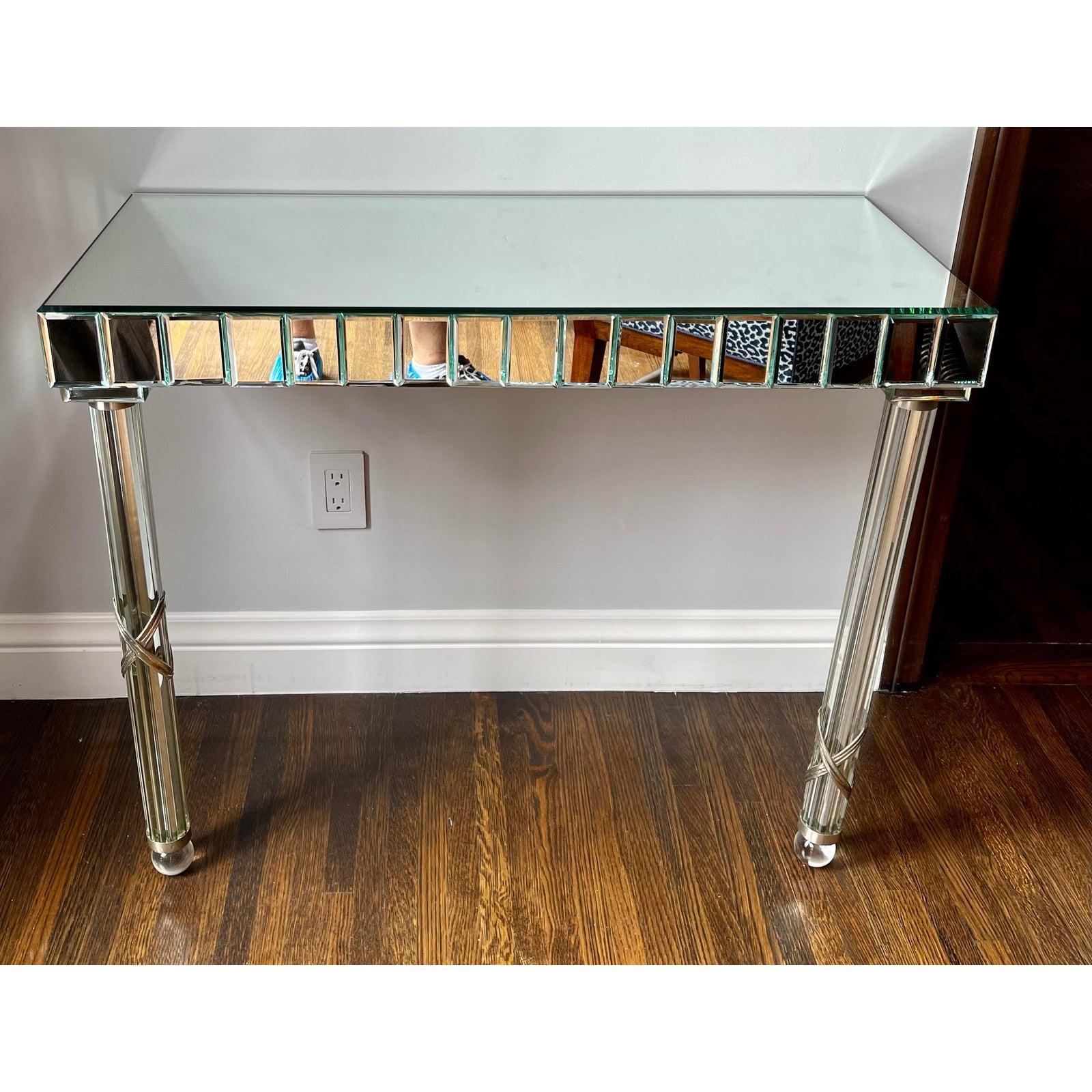 Pair of Antique Art Deco mirrored console table. It features glass rod legs clad in silver.

Additional information:
Materials: Mirror, Wood
Color: Silver
Period: 1940s
Styles: Art Deco
Table Shape: Rectangle
Item Type: Vintage, Antique or