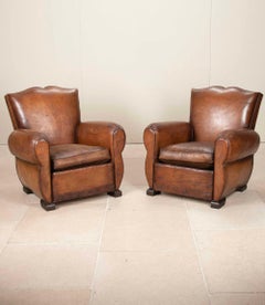 Pair of French Art Deco Moustache-Back Leather Club Chairs