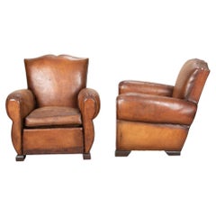 Pair of French Art Deco Moustache-Back Leather Club Chairs