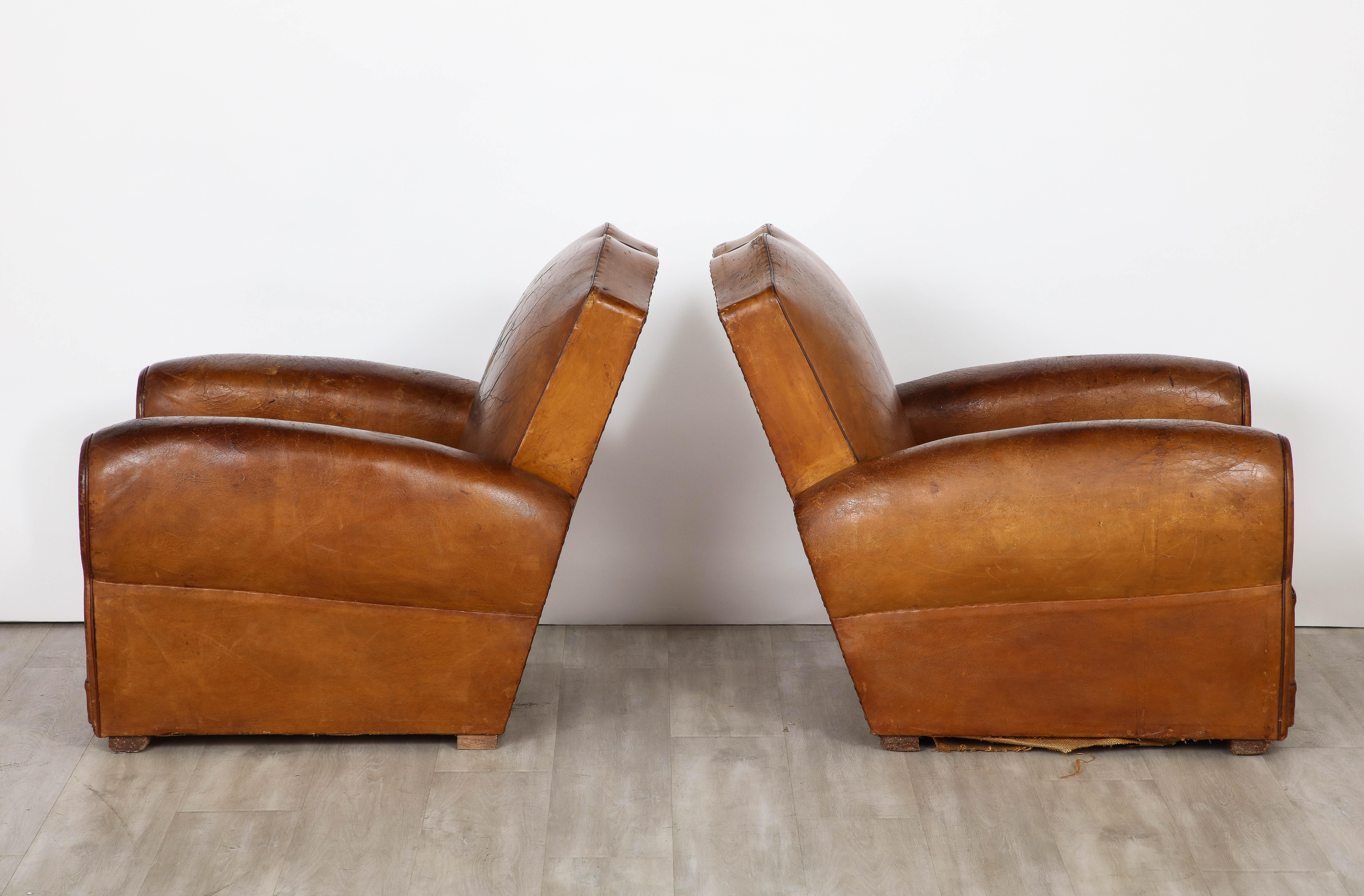 Early 20th Century Pair of French Art Deco 'Moustache' Leather Club Chairs, Paris, circa 1920 