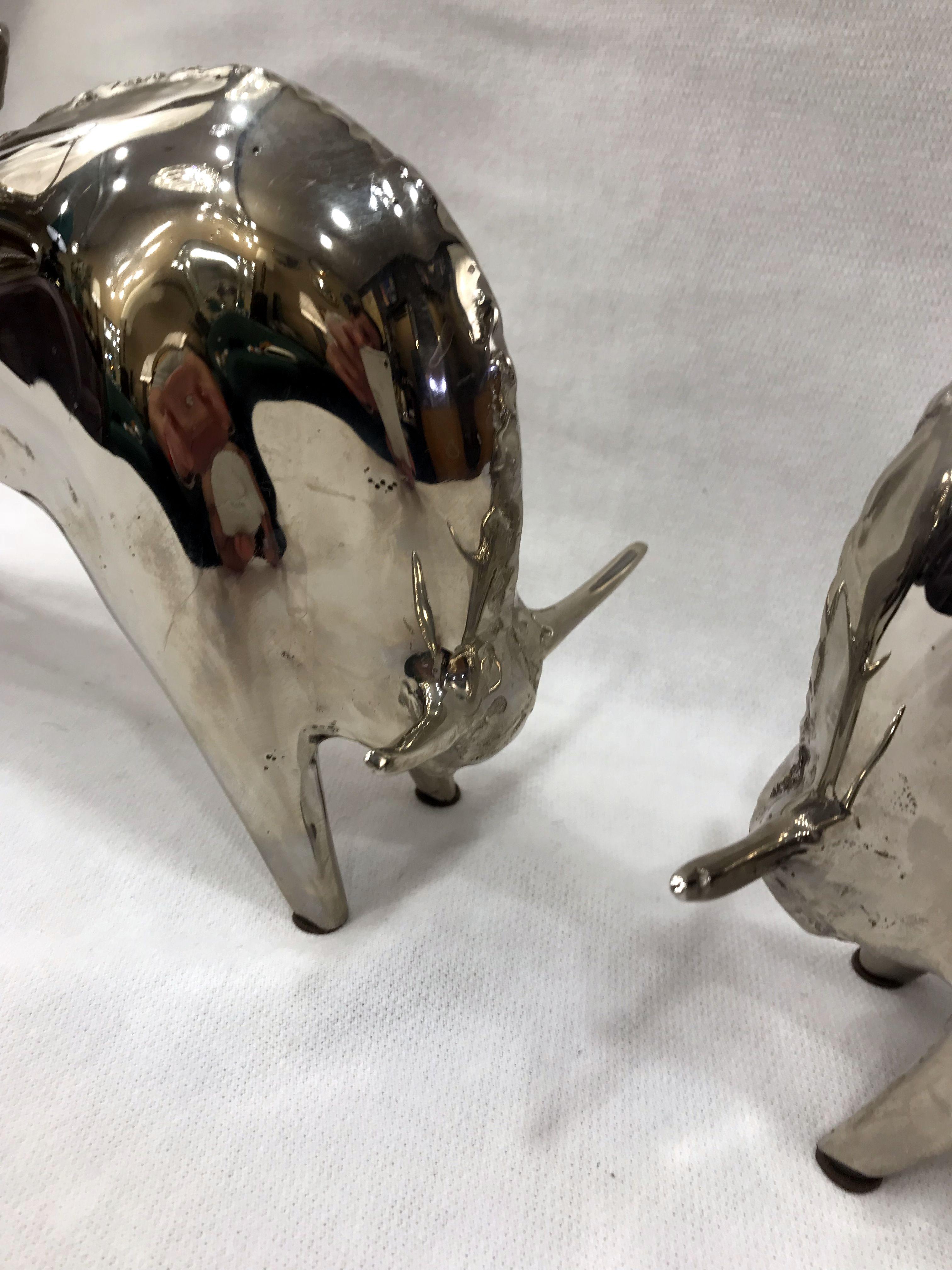 Nickel-plated brass buffalo bookends from France. They are very heavy solid brass. Bookends made in France, 1930-40. Re-galvanized.