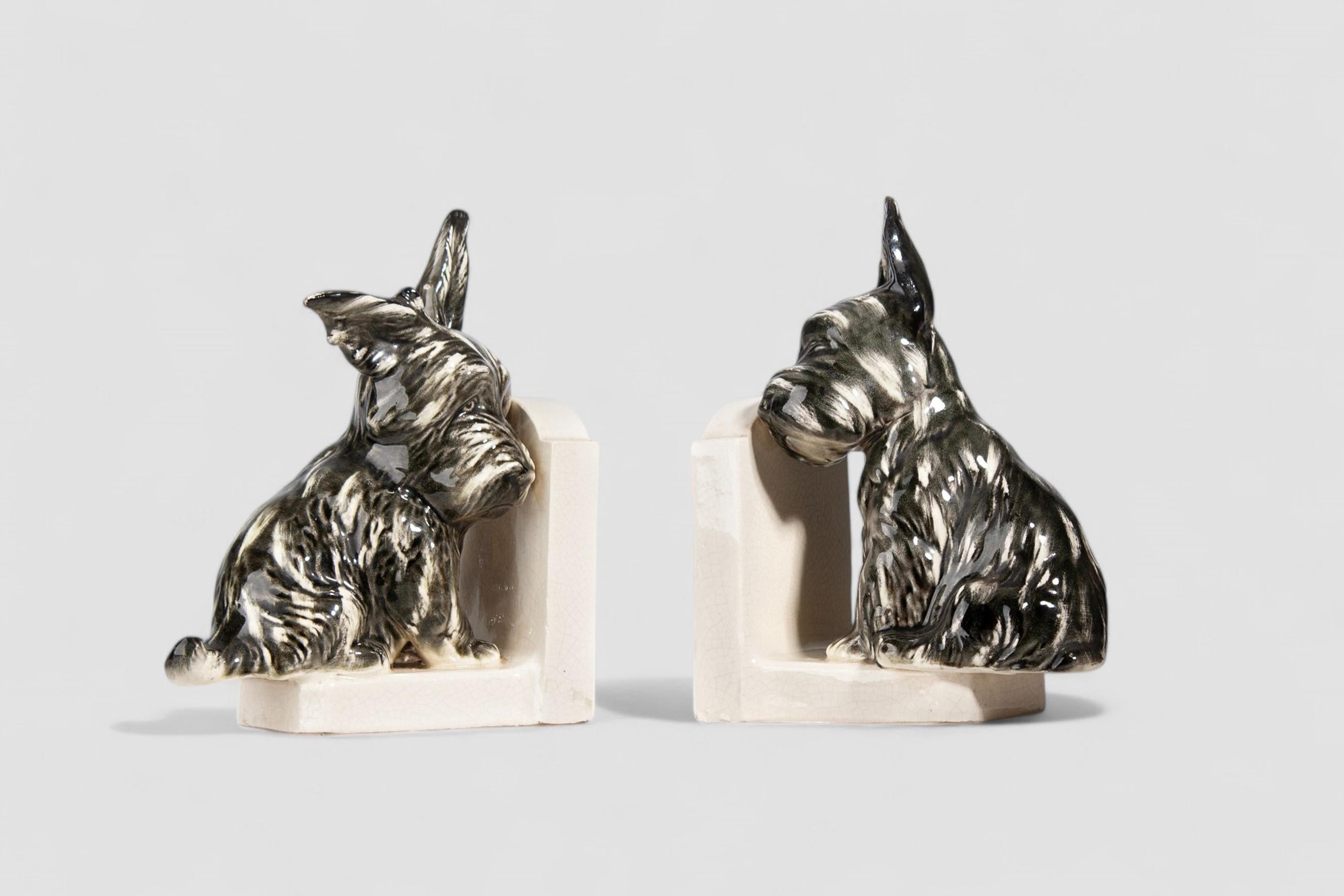 Art Deco Pair of French Art Déco Painted Ceramic Bookends Shaped Like Scotch Terrier Dogs For Sale