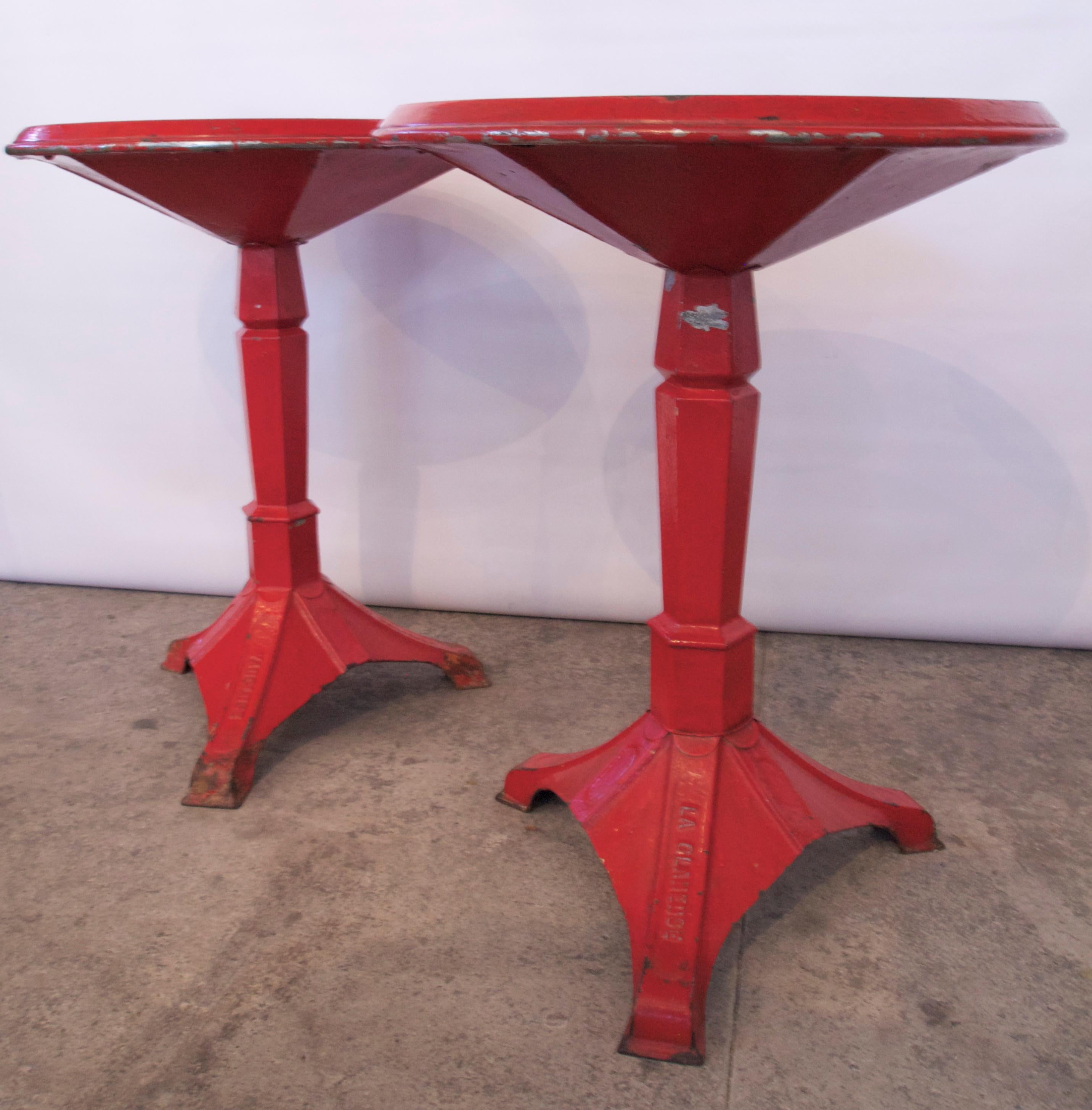 Wonderful pair of French Industrial/ Modern Art Deco Period red painted steel and cast Iron gueridon bistro tables. Manufactured in Cadenet / Departement of Vaucluse.
Turn of the 19th century
Provence, France.