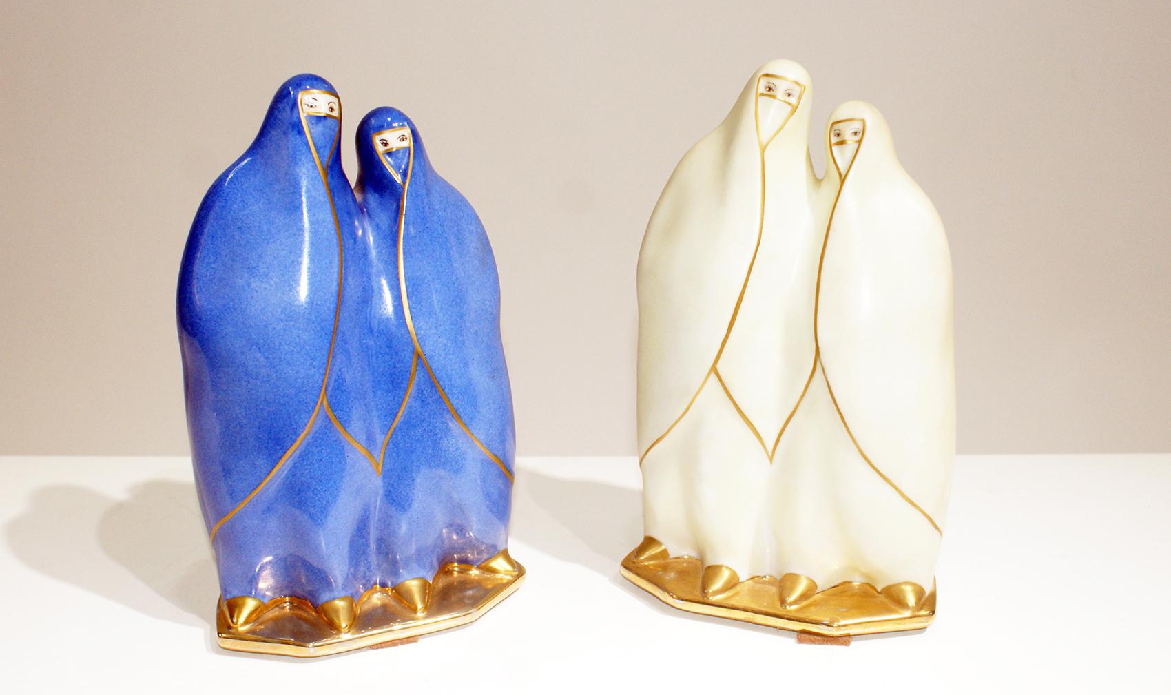 Pair of Art Deco French “Veilleuse”, or night light of Bedouin women in Porcelain. The first in blue color with gilt trim and the second in white color with gilt trim. Can be sold separately
Lovely when lights on. Signed on the reverse