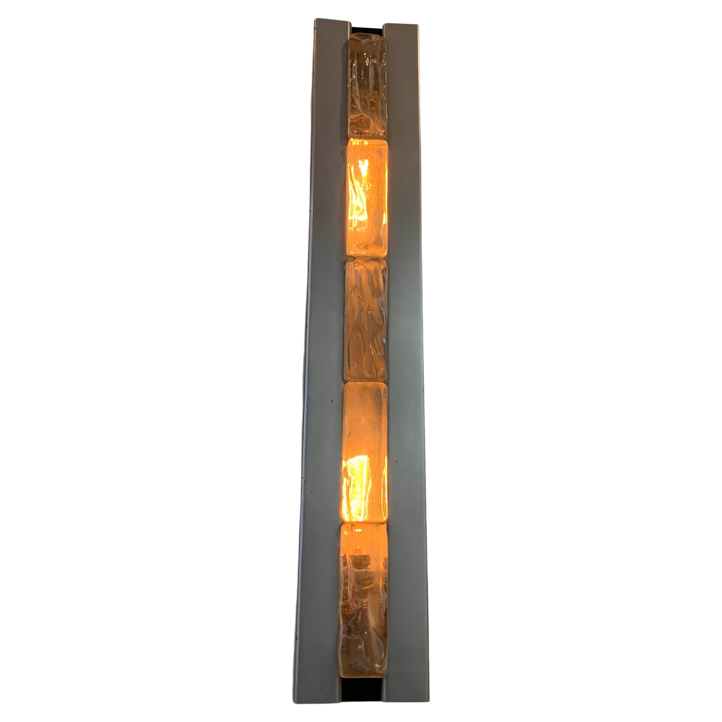 A stunning pair of French Art Deco wall sconces from the 1970s.
Five Saint Gobain brick shades in frosted glass with polished details and a steel frame.
Can be delivered and wired for American or European use.
Each brick measures:
H: 10 cm
W: 3