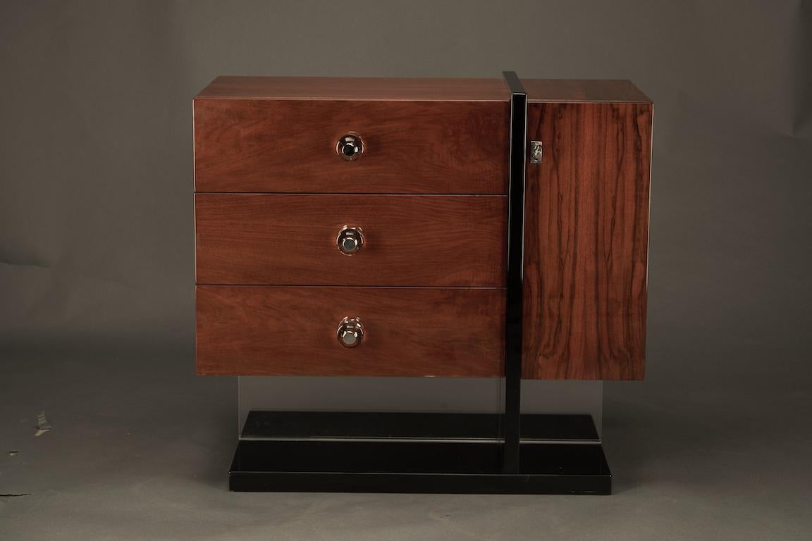 Side table is made out of high quality walnut wool. It has rectangular flat base. Table has 3 horizontal drawers and one vertical drawer with “sphere shape” handles.

Condition is excellent. 

France, circa 1930s

 Measure: 34.5” W x 17.5” D x