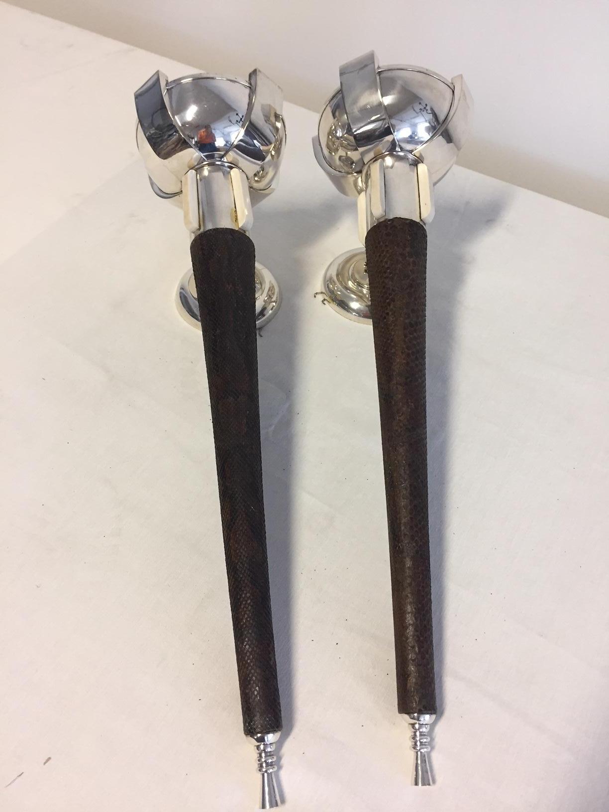 Pair of French Art Deco torch design wall sconces with round bowl design top. Details metal: Base material brass is silver plated, the holder under the bowl has 4 bone bars as embellishment, the bars are attached by screws and wood cones are covered