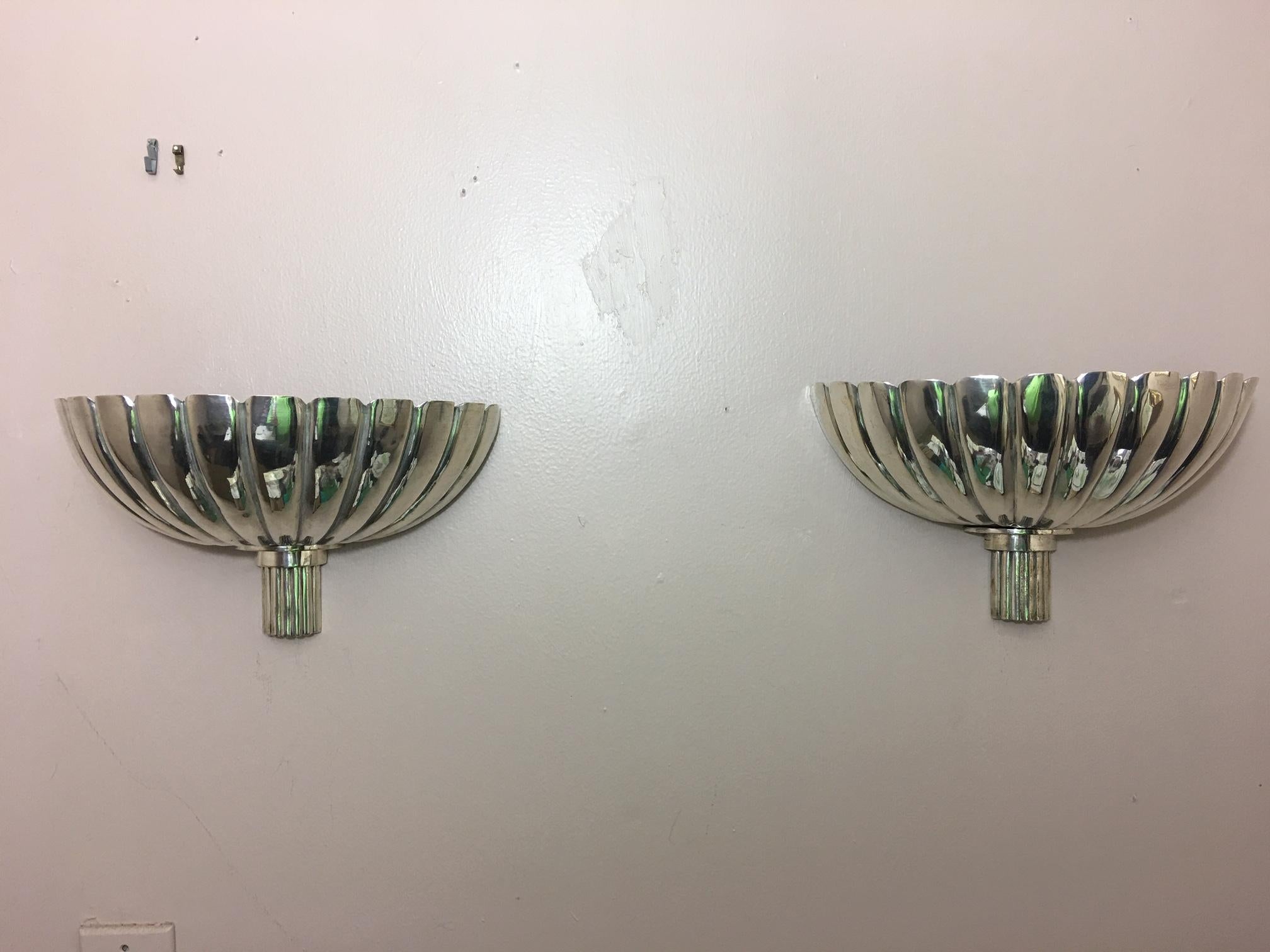 Pair of French Art Deco silver wall sconces, mid-20th century.