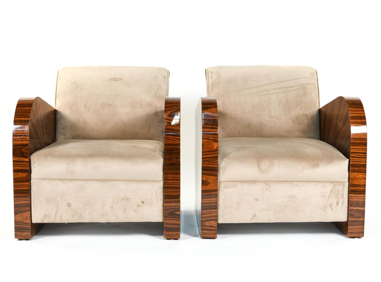 Pair of French Art Deco style zebra wood lounge chairs with ultra-suede upholstery. The chairs have a beautiful zebra wood grain.
