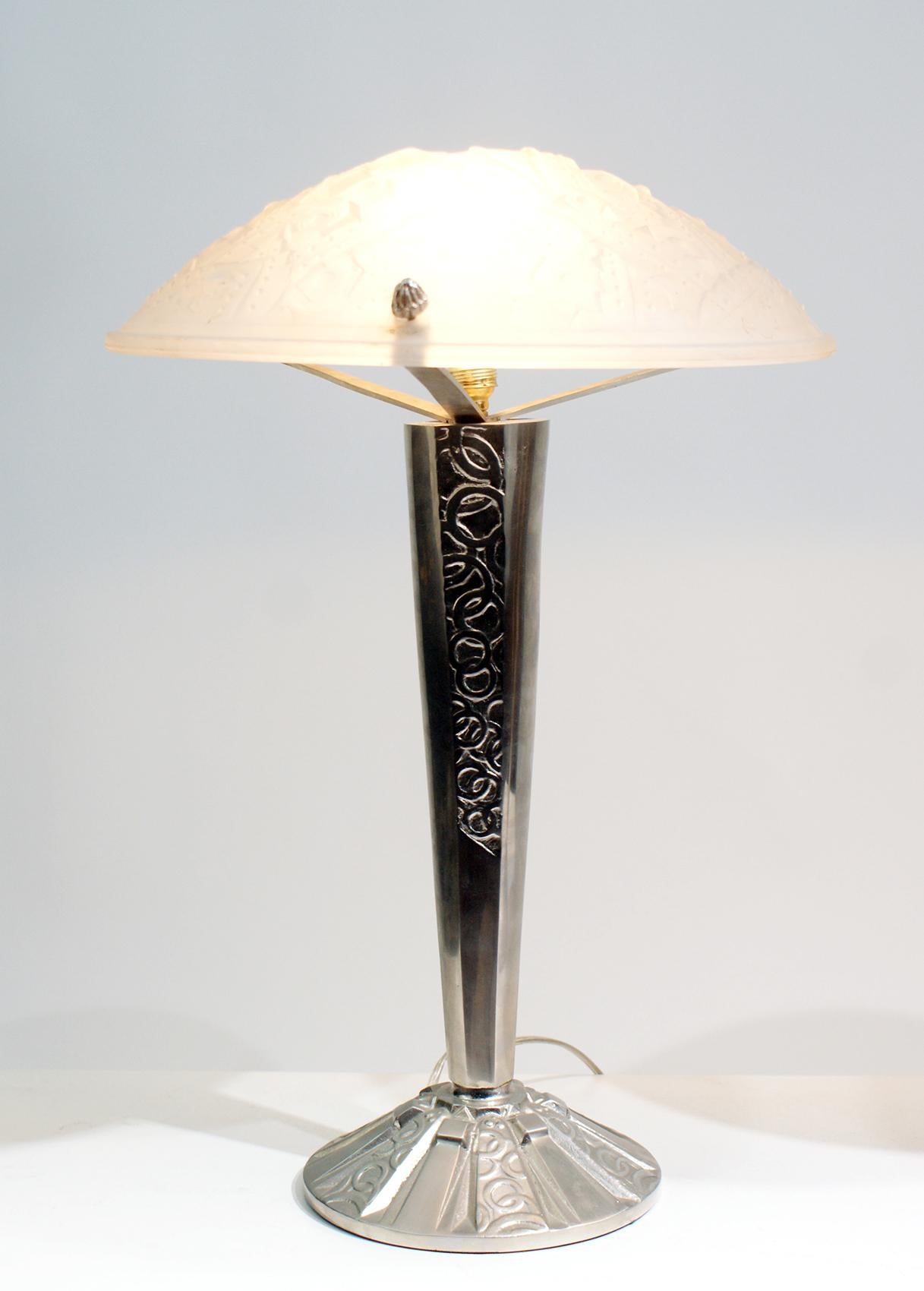 Beautiful pair of Art Deco table lamp, high quality molded glass panel with fruits and leaves motif design in relief included “Muller Frères Luneville” signature on the glass, supported by nickeled bronze metal column with circles motif