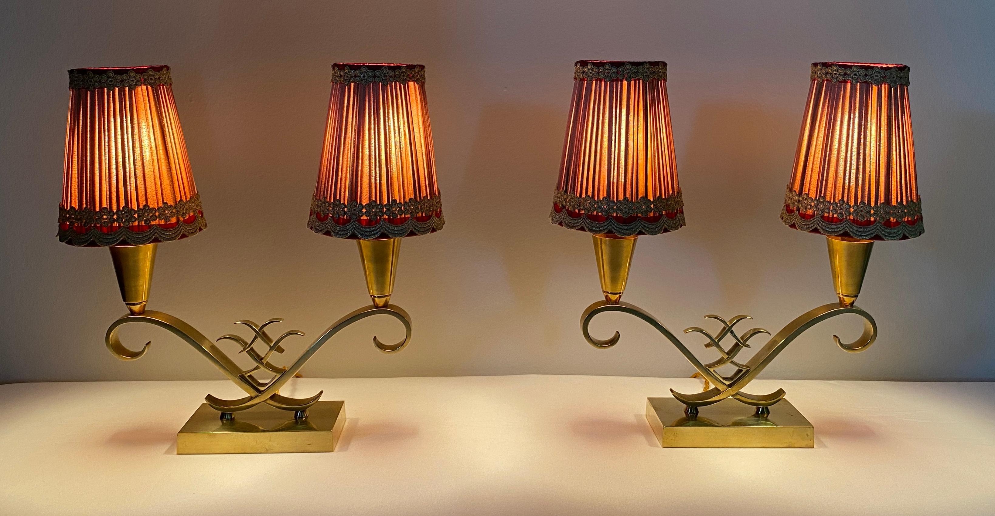 Stunning pair of original antique Art Deco table lamps attributed to Jules Leleu. Based on the Neoclassical form, the geometric design is unique and elegant.  With these features they would suit a range of interiors such as Antique, Art Deco,