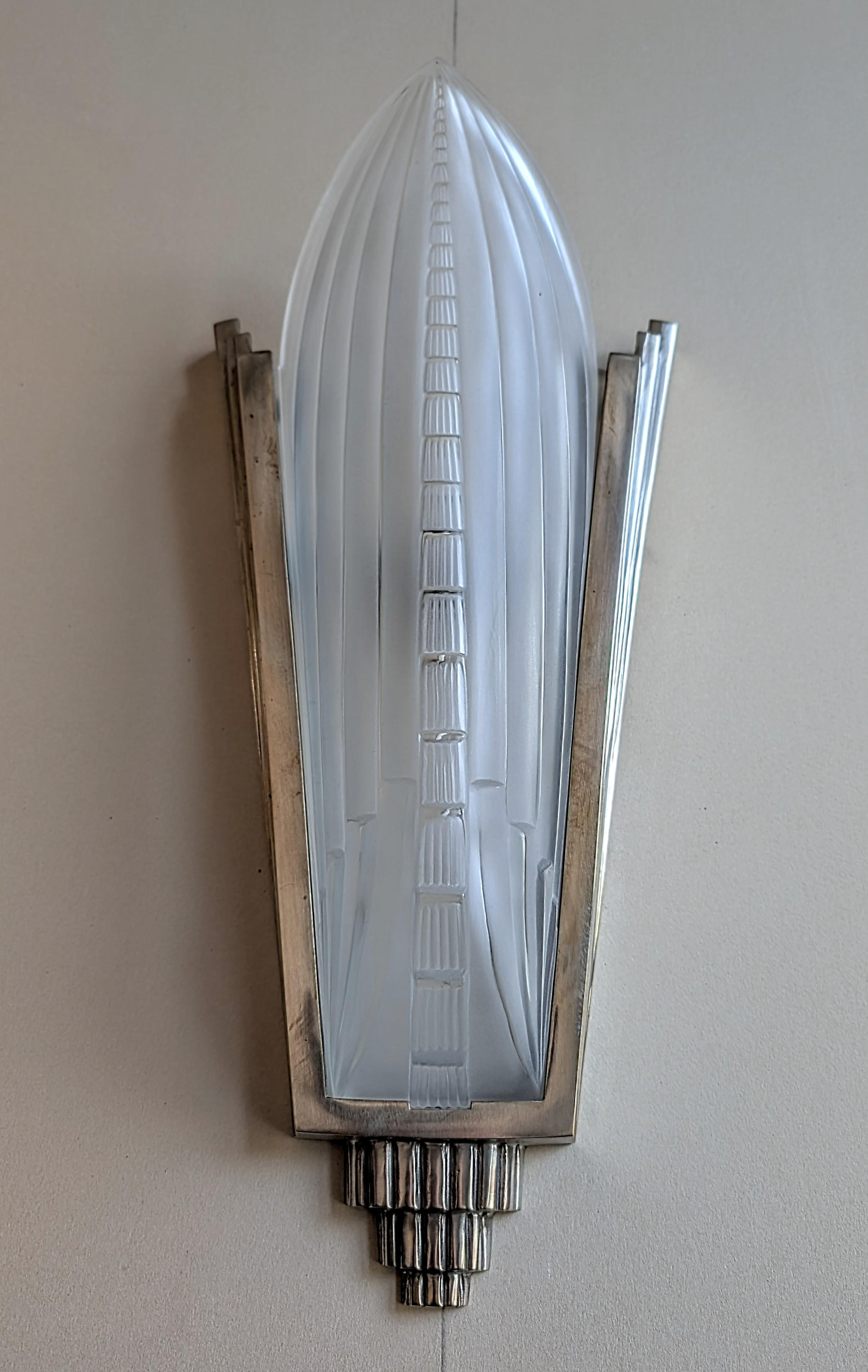 On Sale for a limited time...! from $8850 to $6590.
A pair of French Art Deco wall sconces by the French artists 
