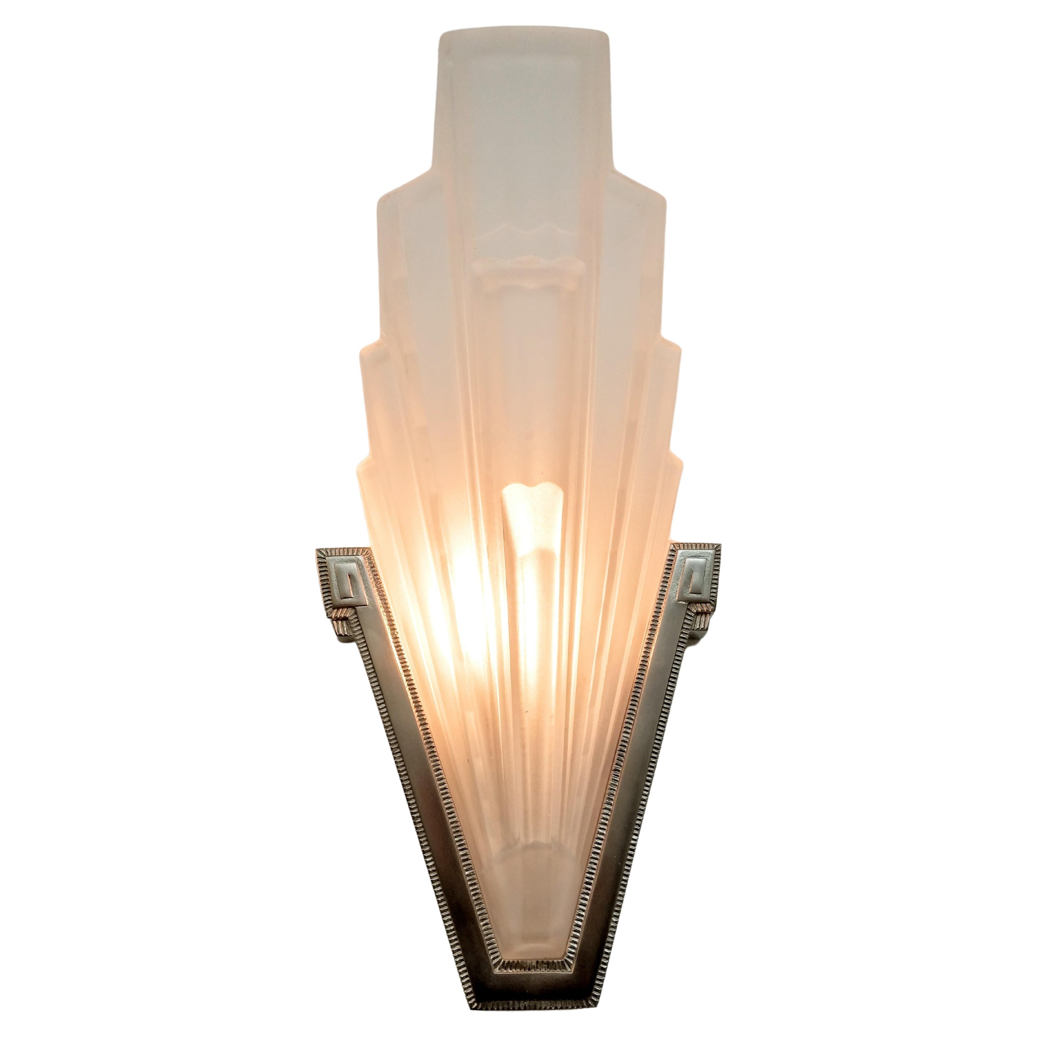 On Sale...! for limited time from $6990 to $4990.
A pair of French Art Deco wall sconces created by the French artist 