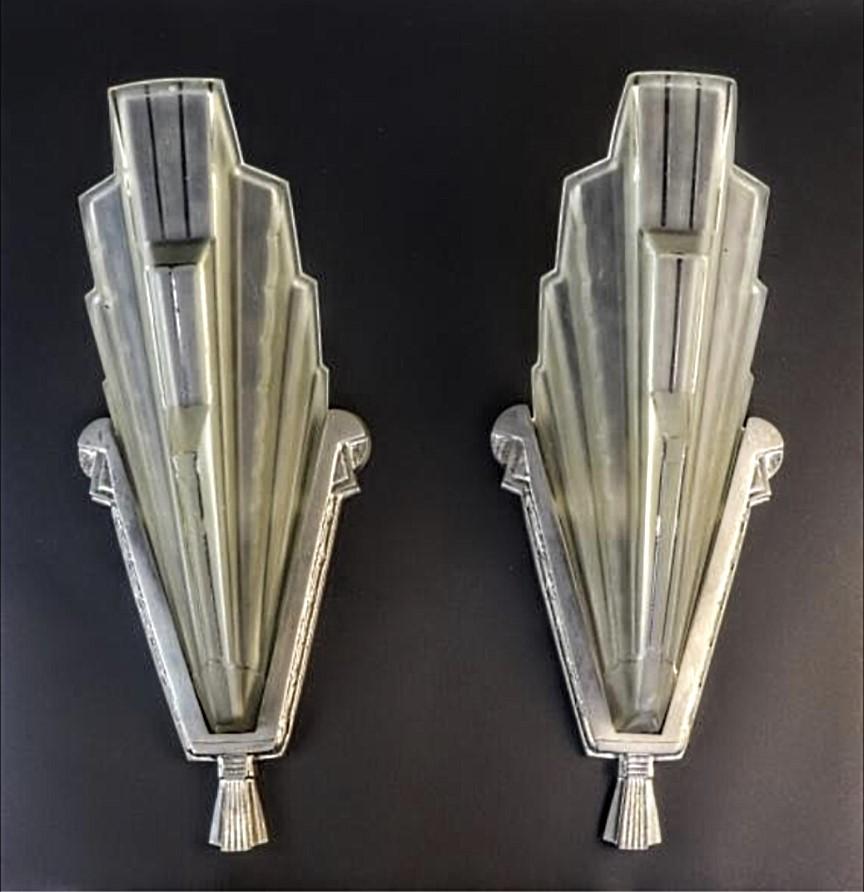 On sale for limited time...!  from $6950 to 4950.
A pair of French Art Deco wall sconces created by the French artist 