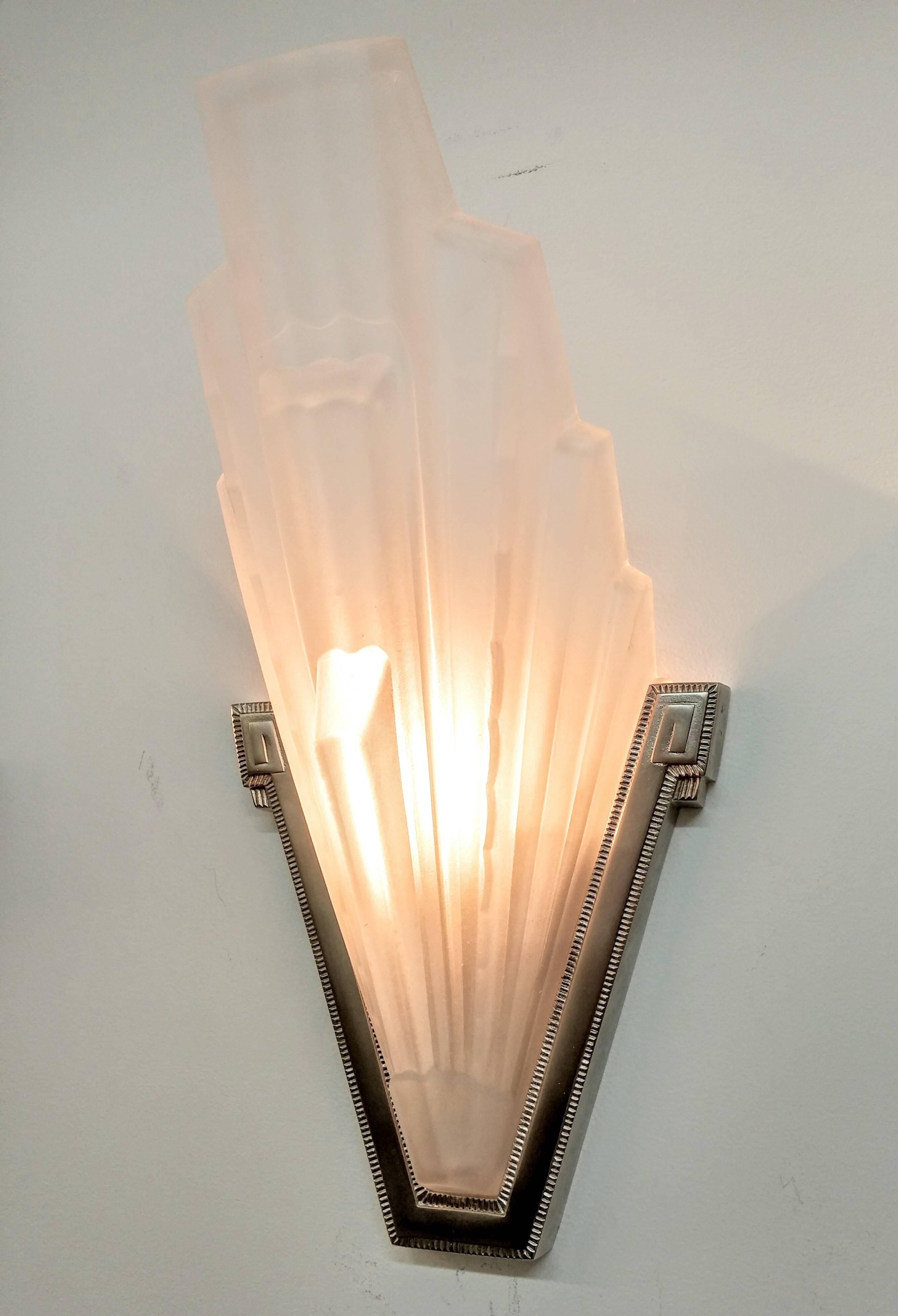Cast Pair of French Art Deco Wall Sconces by Sabino For Sale