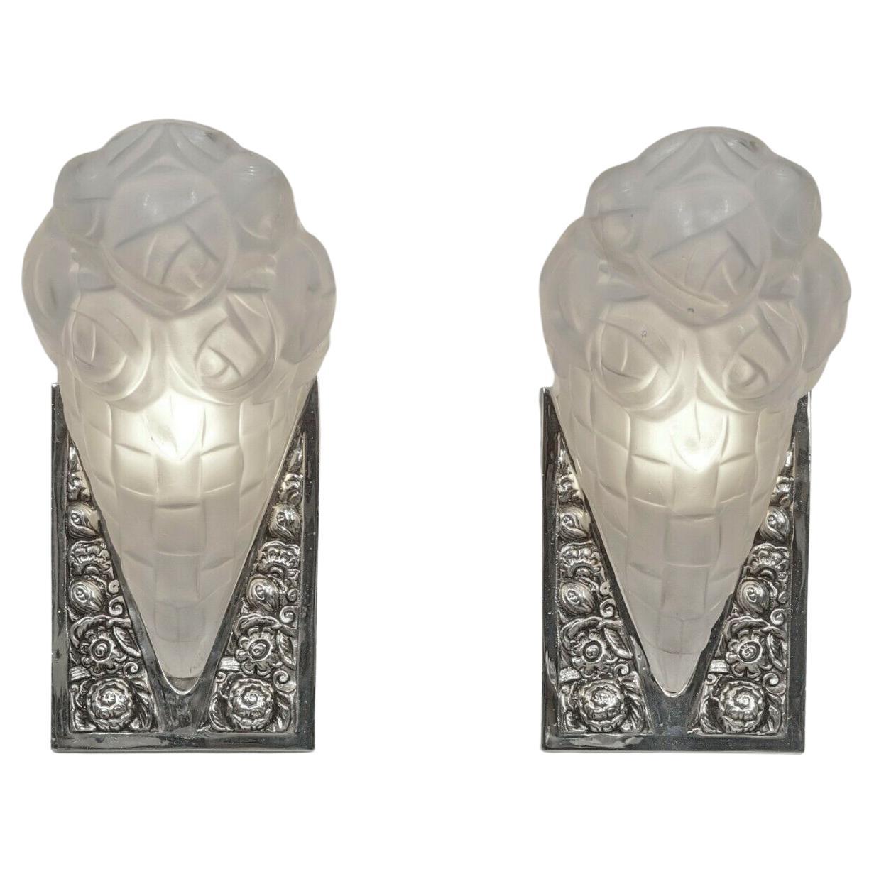 Cast Pair of French Art Deco Wall Sconces Signed by Degue For Sale