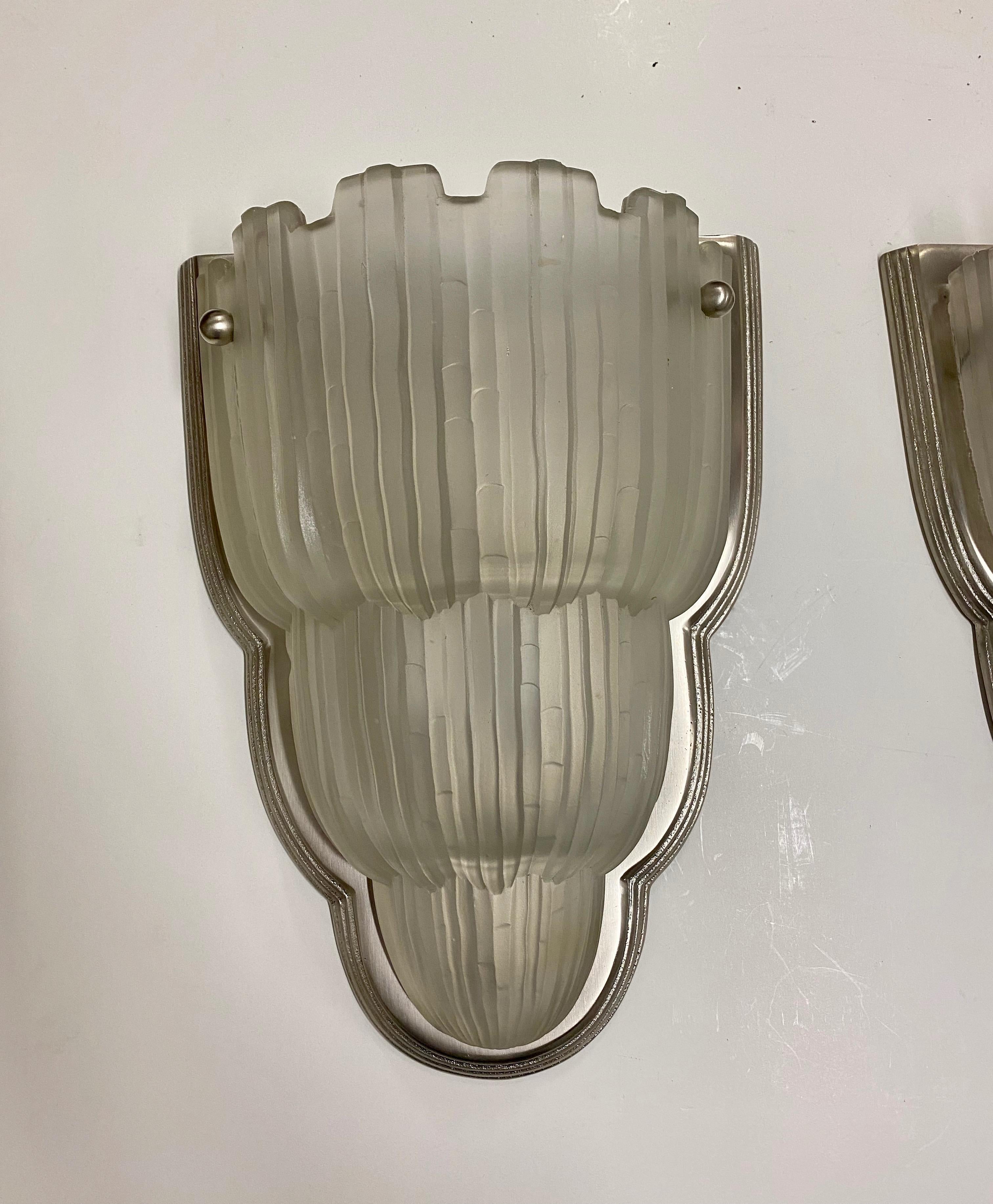 Glass Pair of French Art Deco Wall Sconces Signed by Sabino For Sale