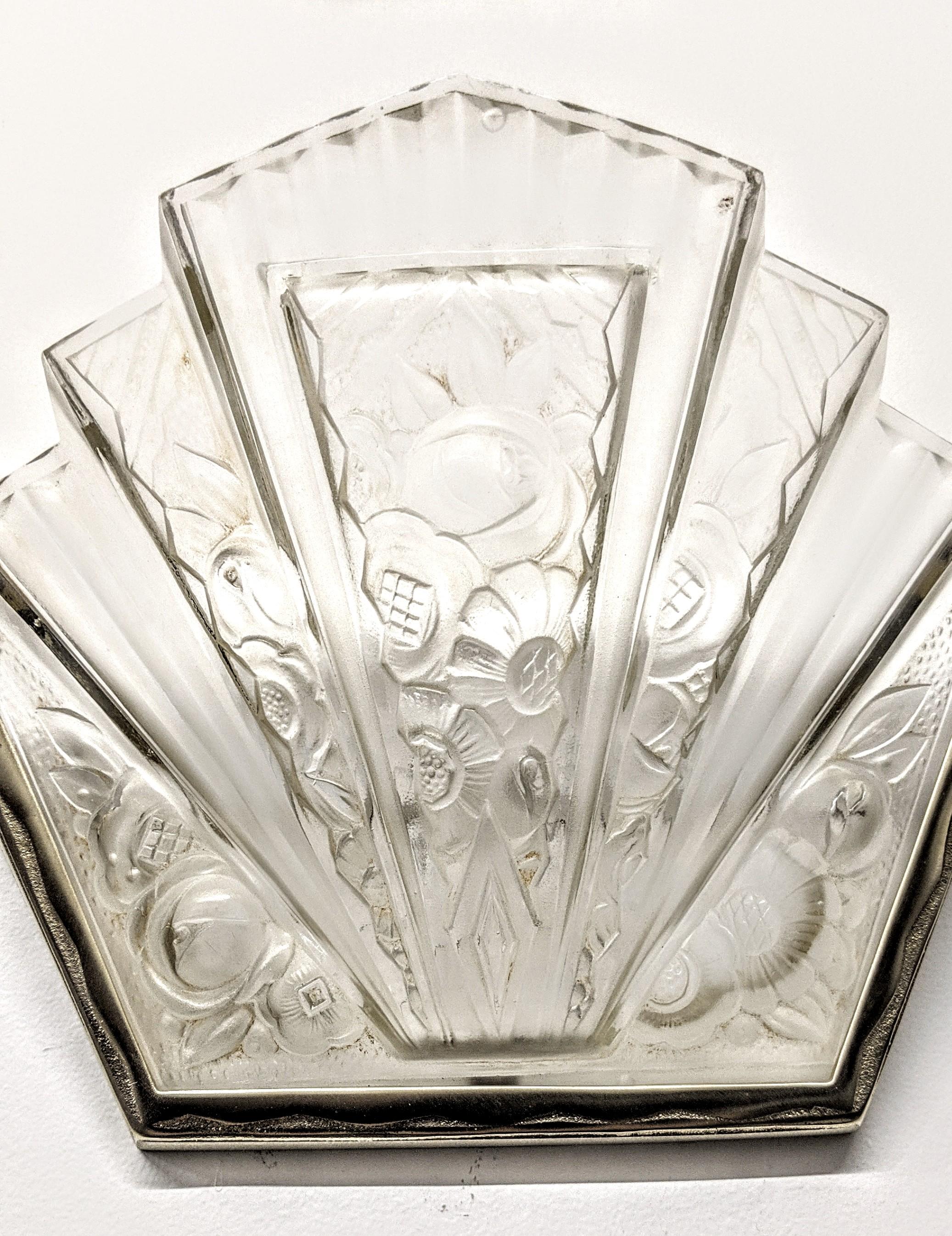 On sale for limited time...!  from $6950 to 4950.
A pair of French Art Deco wall sconces was created by the French artist 