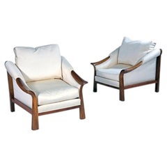 Pair of French Art Deco Walnut Lounge Chairs in the Style of Pierre Chareau