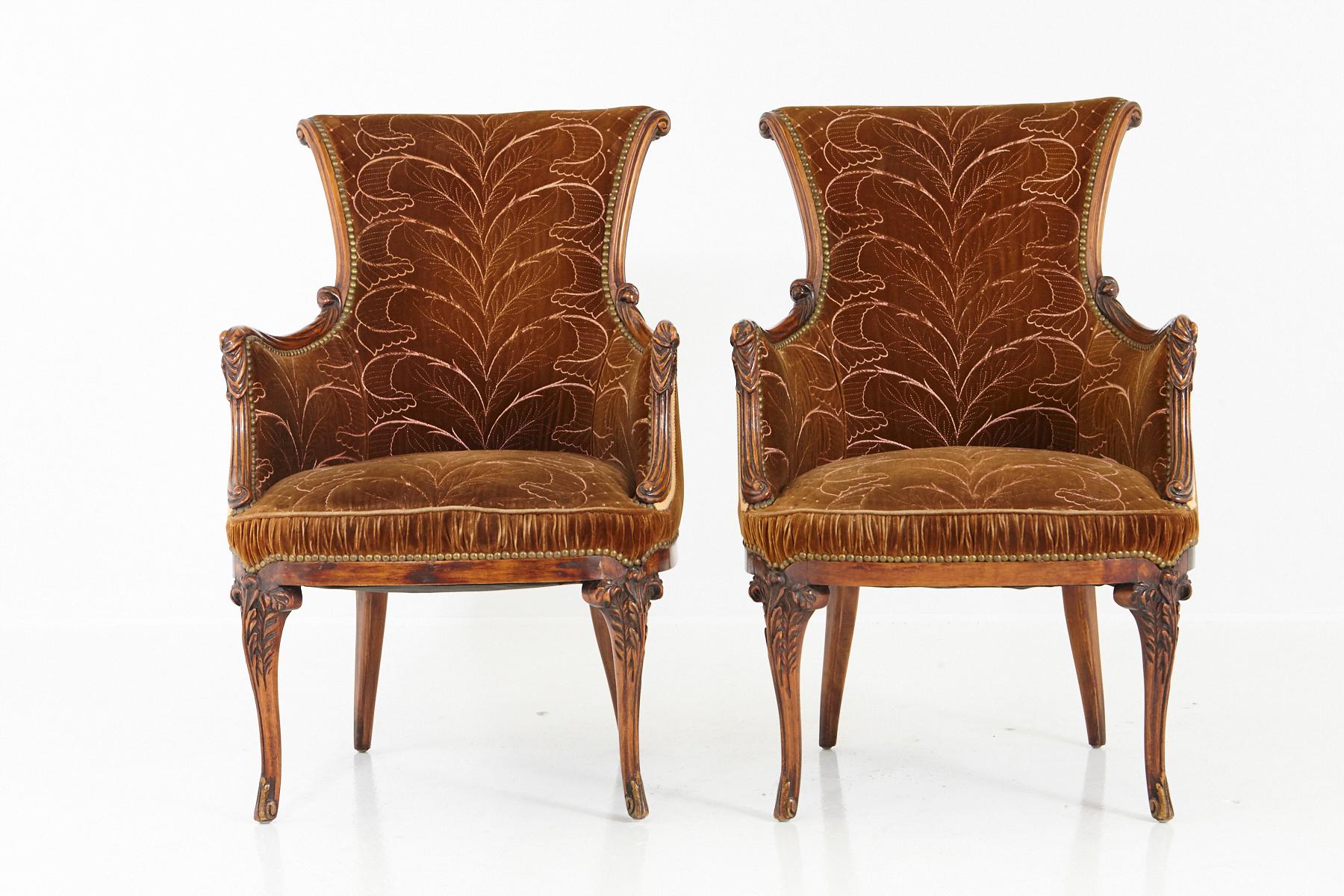 Exceptional pair of French Art Nouveau armchairs upholstered in a richly decorated two-tone cognac-colored velvet, France, circa 1900. The inner part of the chair is covered in embroidered velvet, while the outside is covered in a lighter