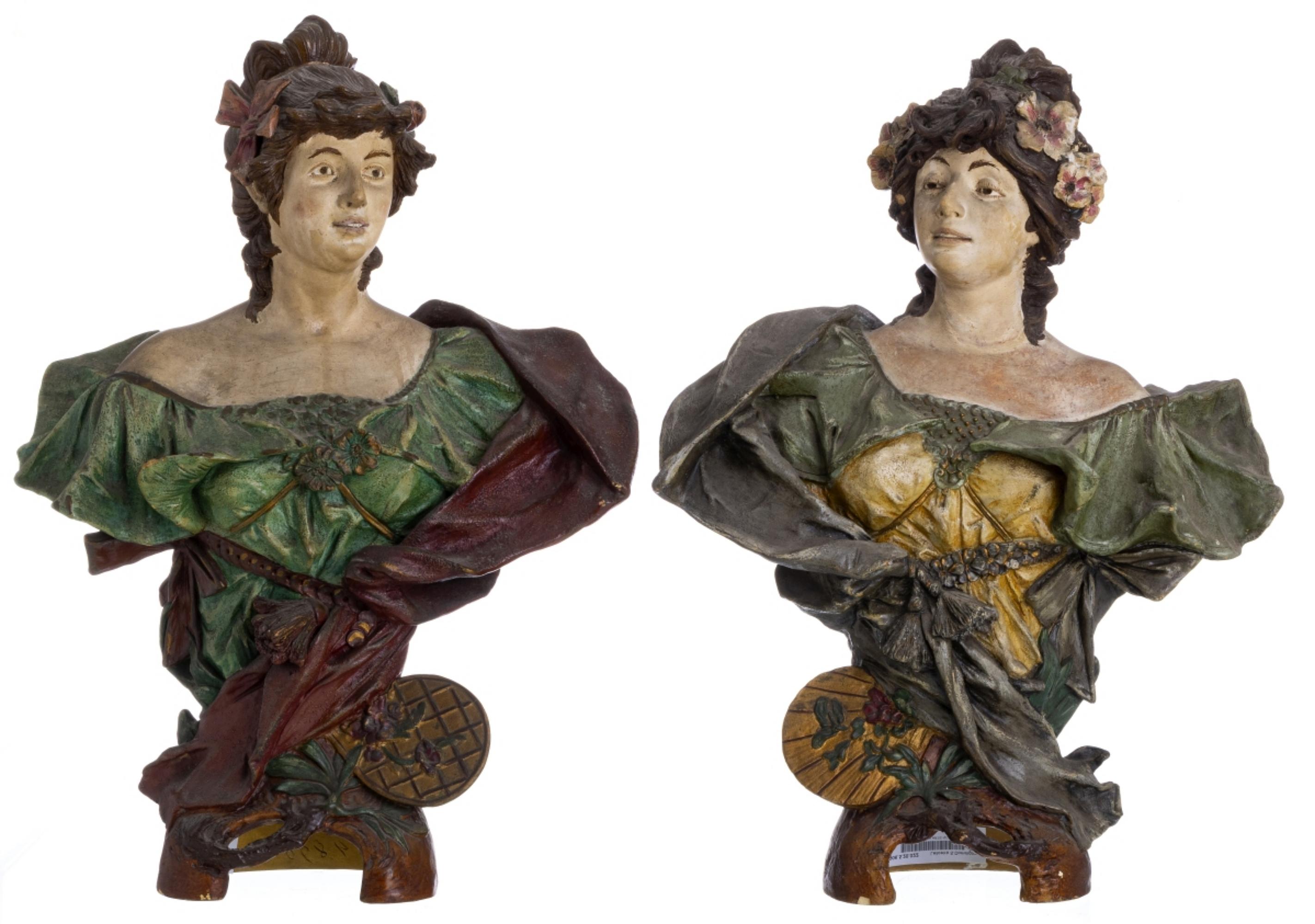 Pair of French Art Nouveau female busts 
from the beginning of the 20th century
in painted and gilded terracotta.
Small flaws one features collage.
Height: 48 cm.
Good conditions.