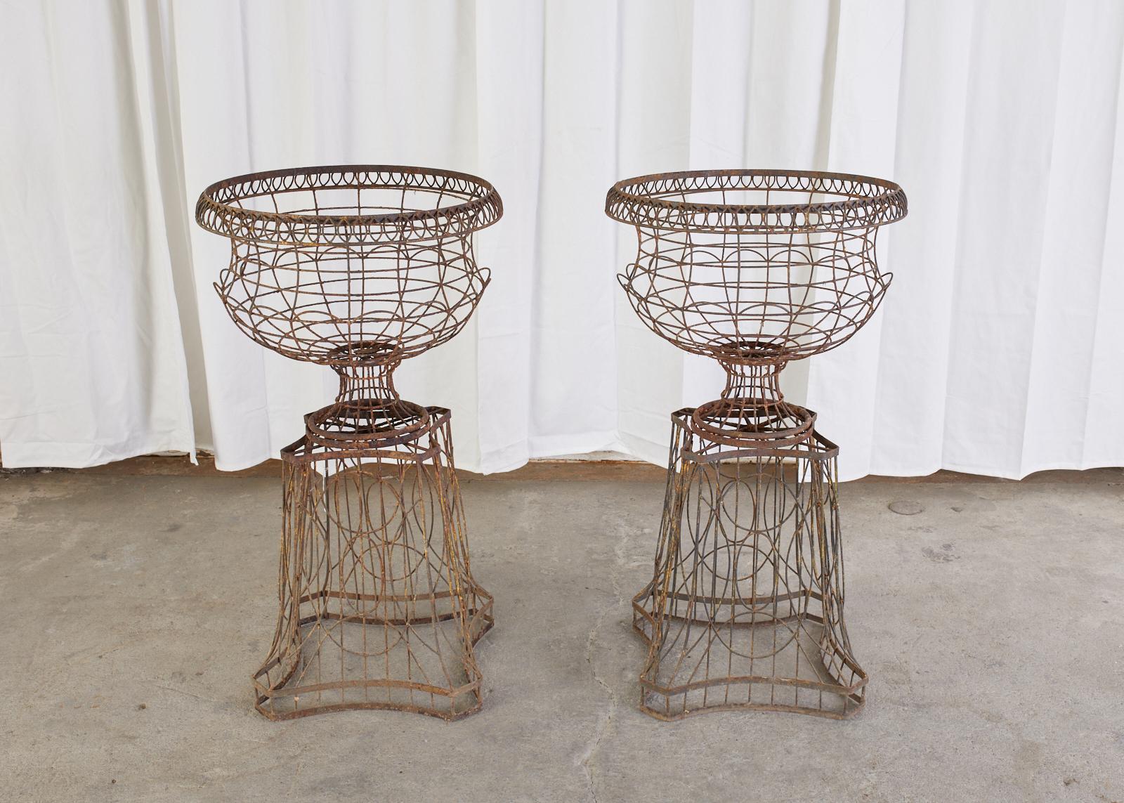 Hand-Crafted Pair of French Art Nouveau Iron Jardinieres on Stands