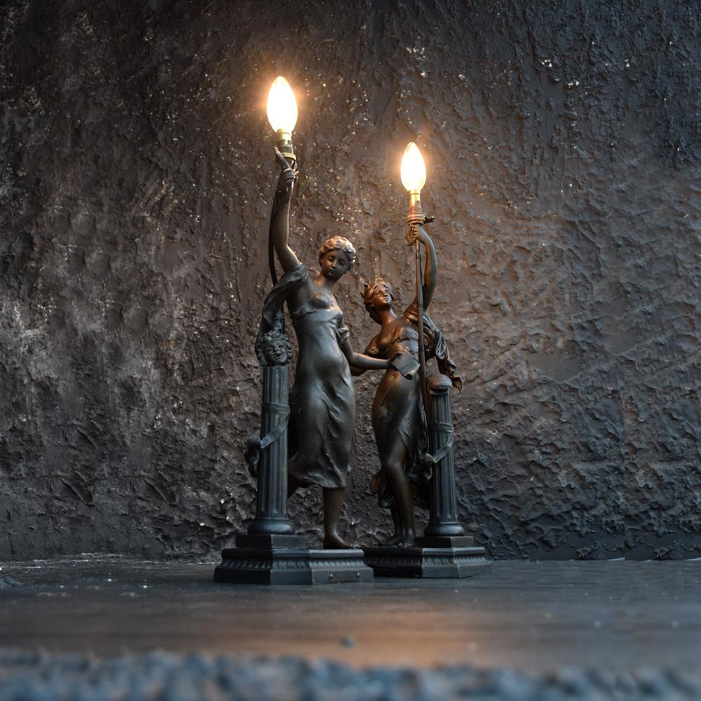 Pair of French Art Nouveau Mathurin Moreau classical spelter table lamp figures, 19th century
We are proud to offer a pair of highly decorative late 19th century cast bronze spelter French Art Nouveau light figures. Stamped Comedie & Musique (Par