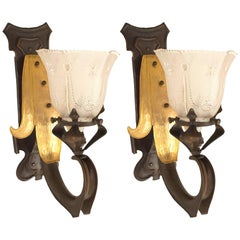 Pair of French Art Nouveau Copper Fleur de Lis Wall Sconces