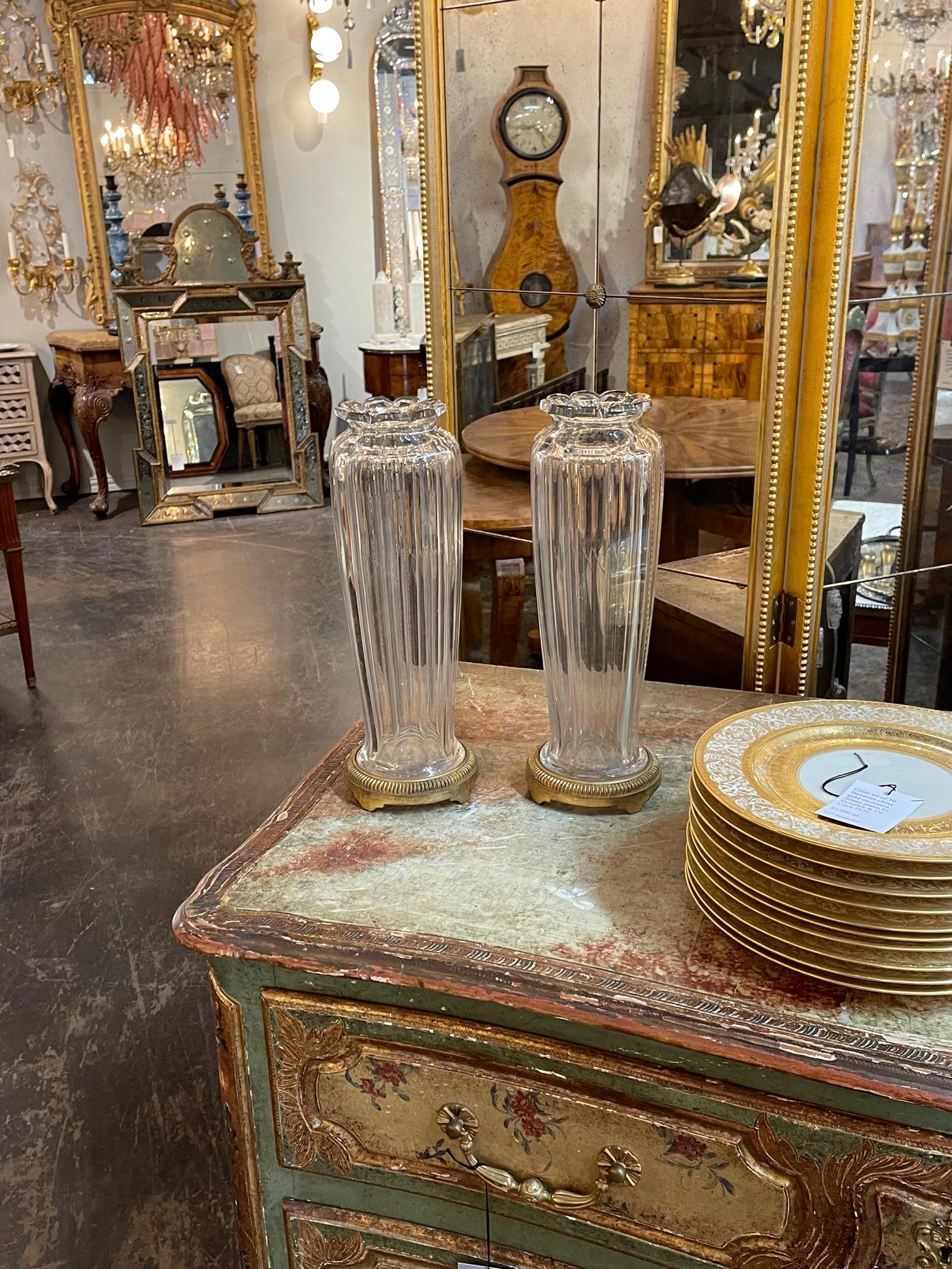 Pair of late 19th century French baccarat crystal vases on gilt bronze base, Circa 1890. These are beautiful classic design that will accent any home.