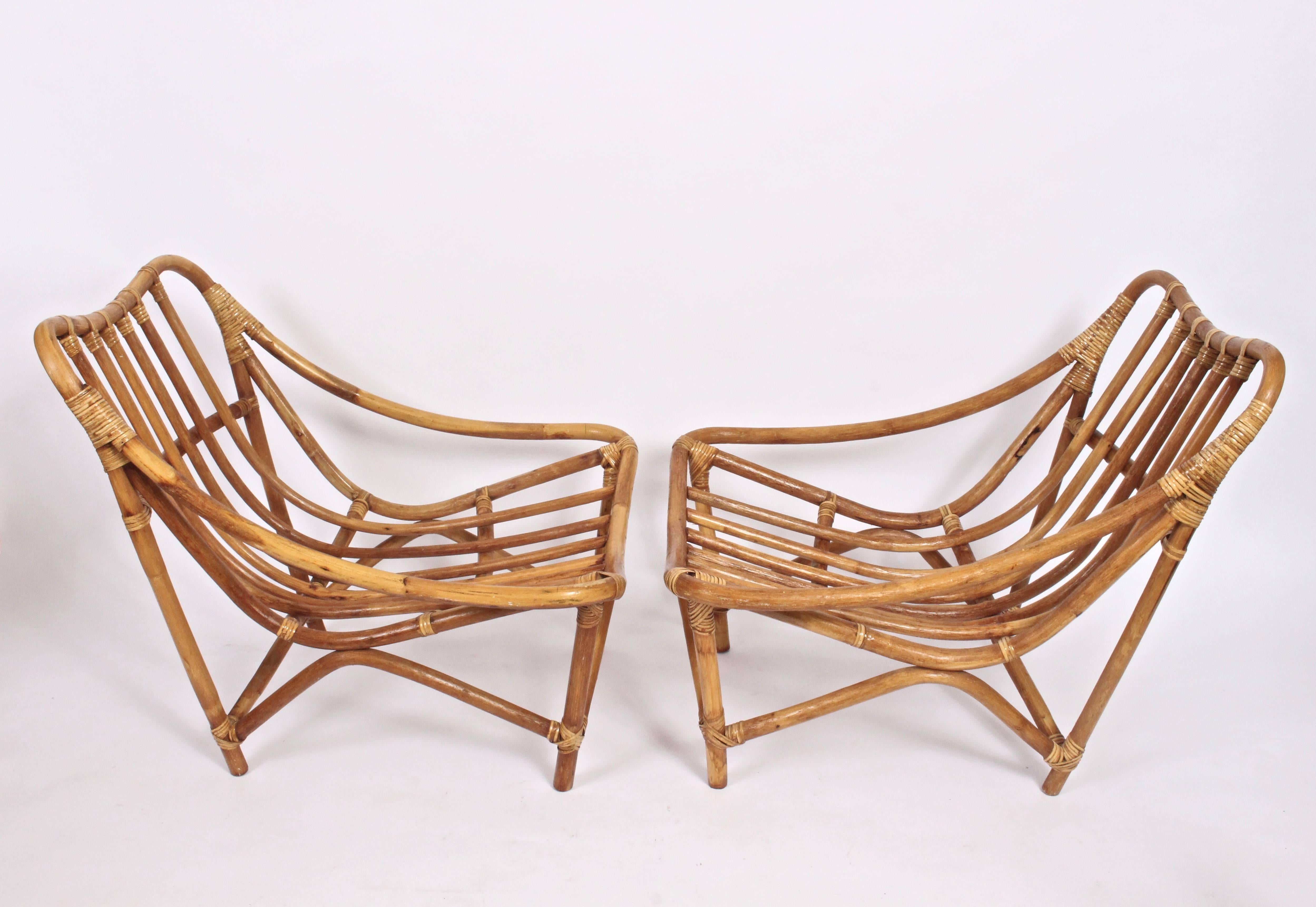 Substantial oversized Organic Modern European Rattan wrapped Bamboo Armchairs. Comfortable. Smooth curved lines.  Arm height 16 H. Shown without cushions. As seen in the film Beautiful Boy. Perfect for dry outdoor climates. Palm Springs. French