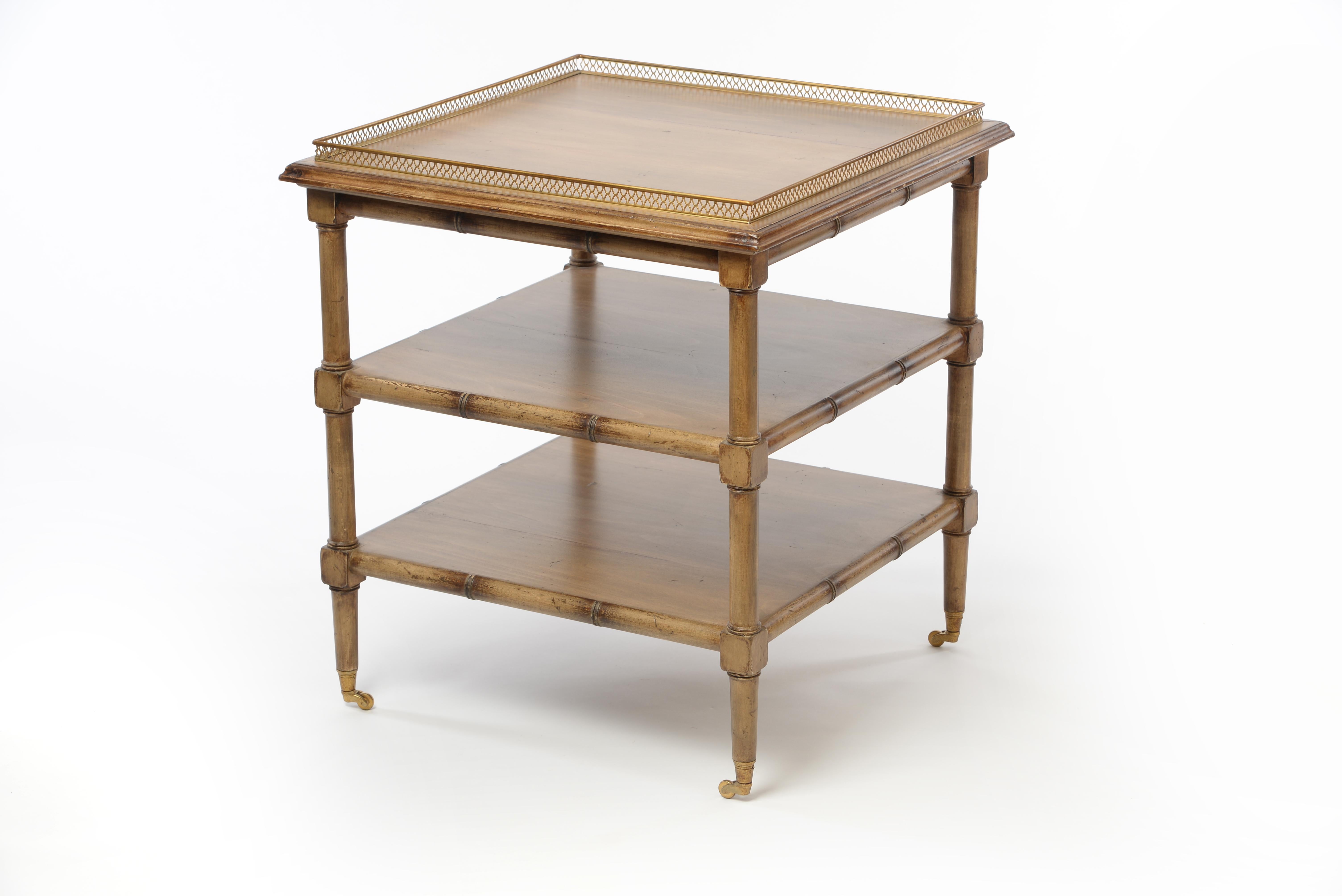 Very elegant bamboo side tables with three fixed tops offering great storage. Sophisticated brass details around the first top adding additional style. Wheels giving extra character and flexibility. Also nice to be used as nightstands. The table are