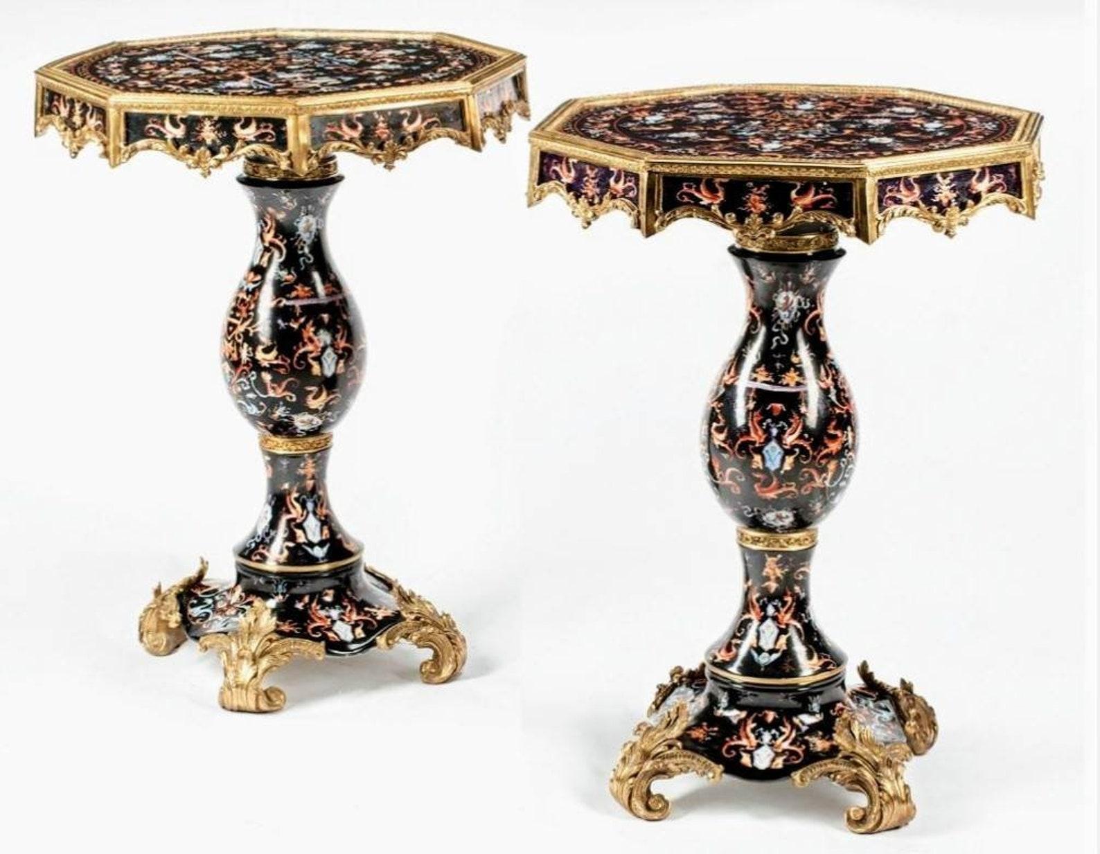 An exceptional pair of stunning, rare, very fine quality French Baroque style gilt bronze mounted polychrome porcelain and lacquer side tables. 

Featuring an octagonal top, heraldic motif, rising on vasiform standard with undulating shaped base,
