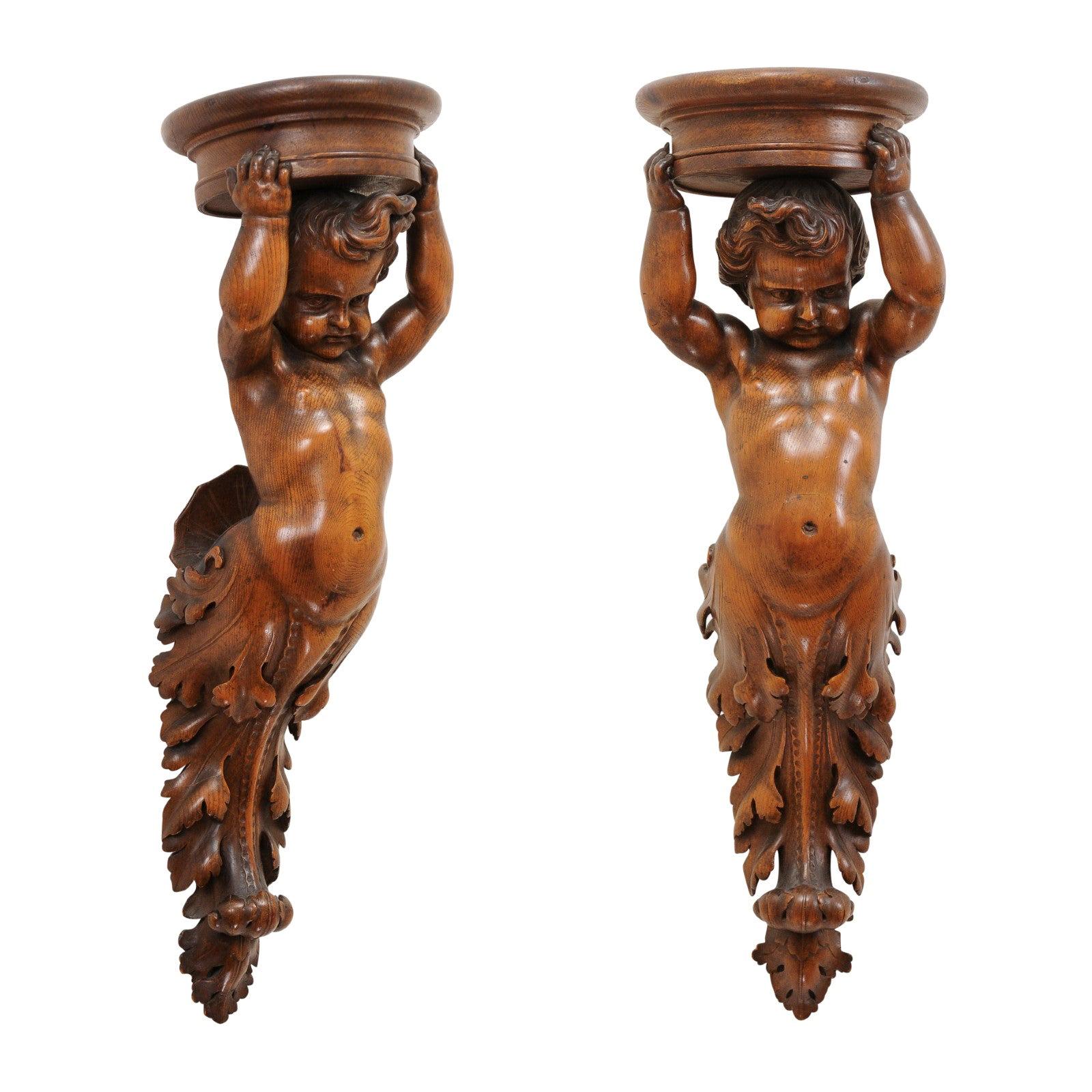 Pair of French Baroque Style 1810s Walnut Wall Sconces with Carved Putti For Sale