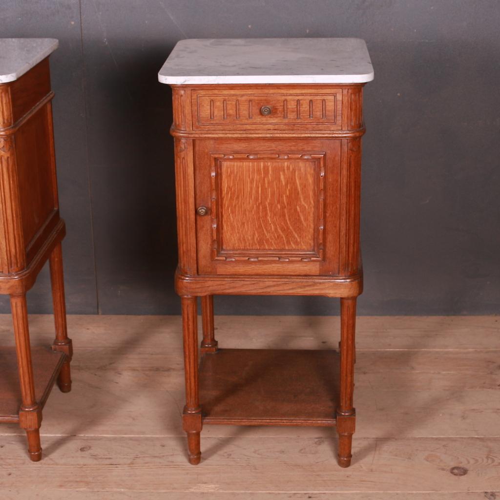 Pair of early 20th C French oak bedside cupboards, 1910.

Dimensions
16 inches (41 cms) wide
16 inches (41 cms) deep
33.5 inches (85 cms) high.