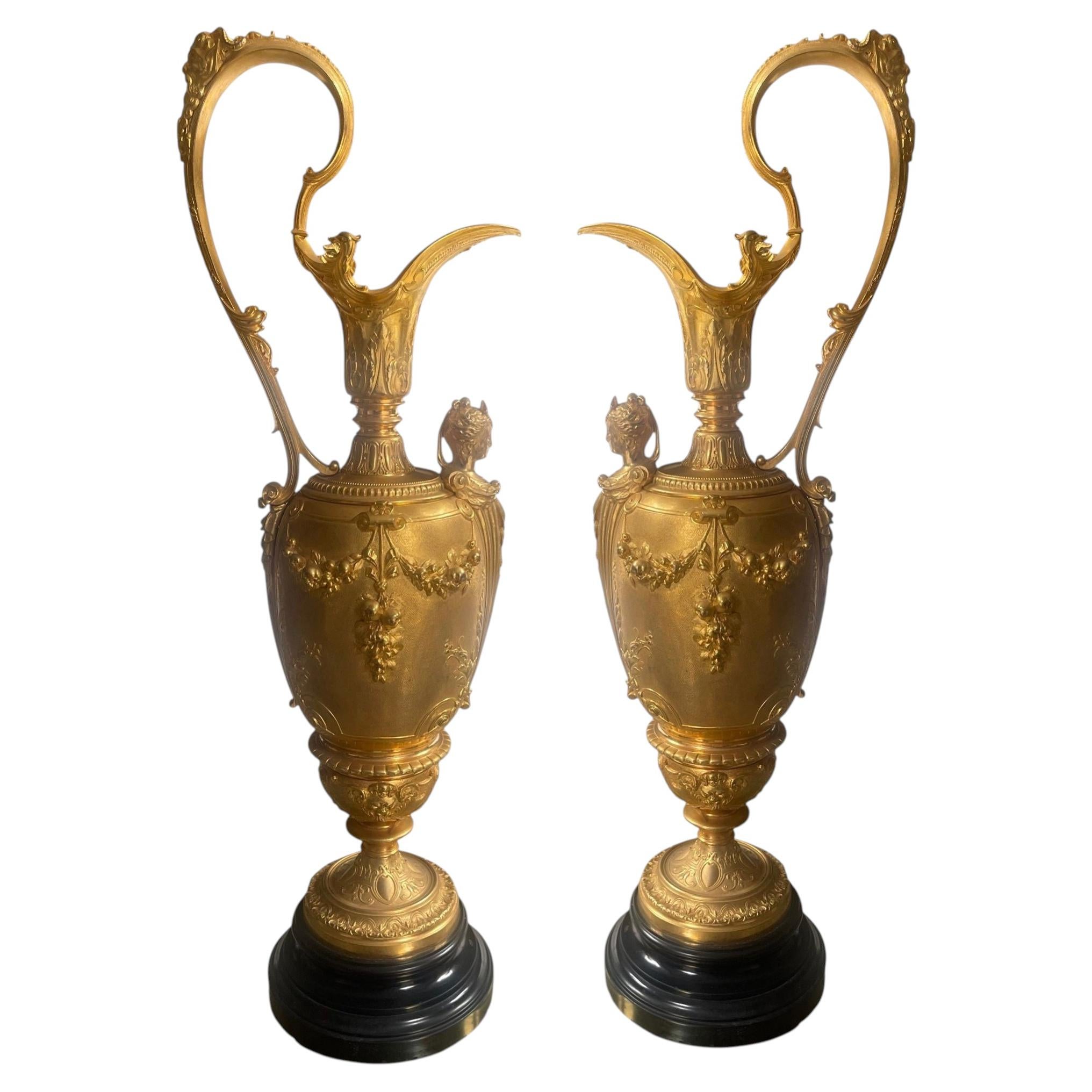 Pair of French Belle Époque Gilt Bronze Ewers on Marble Bases. Late 19th Century